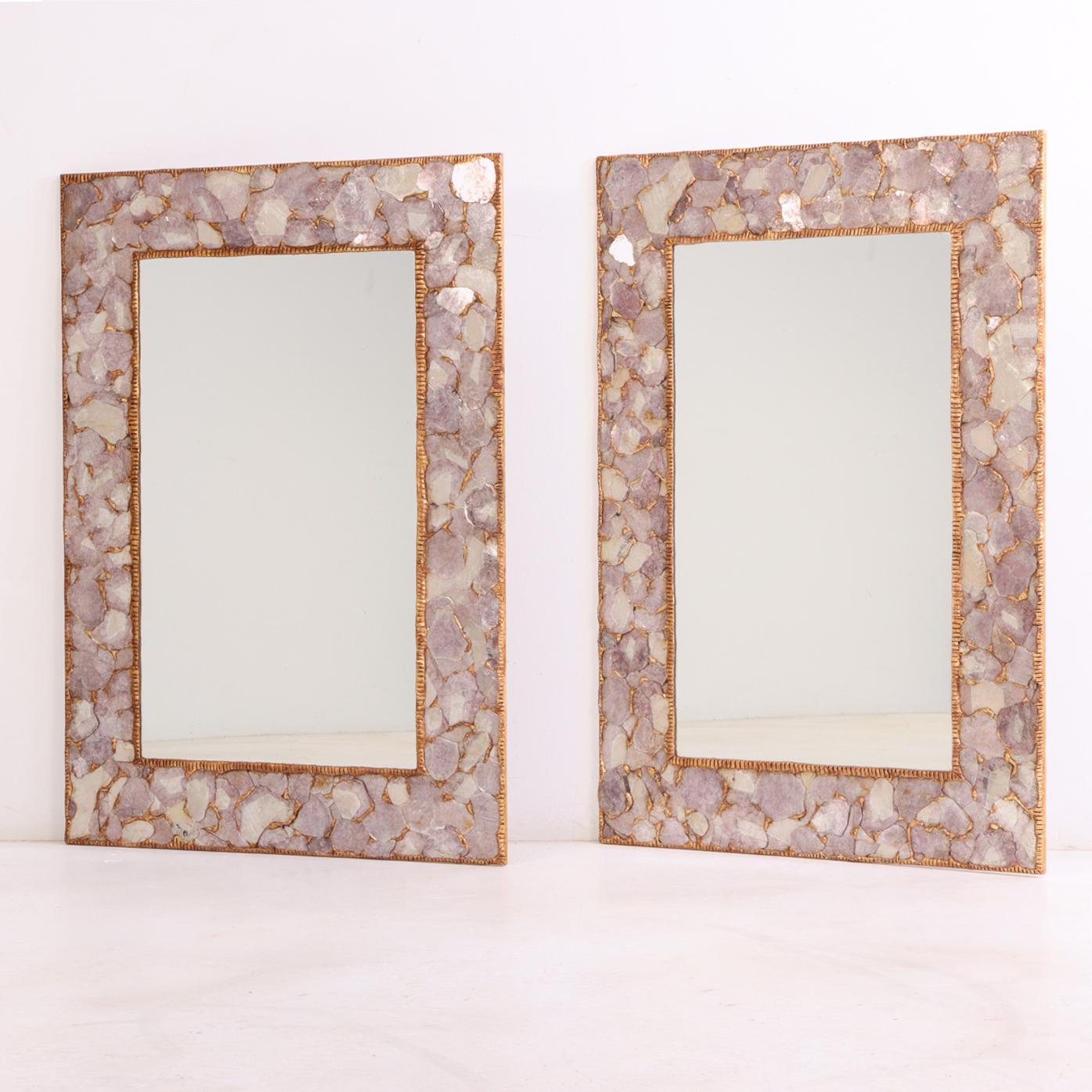 A wonderful pair of large rectangular mirrors which were constructed with Lilac Mica. This versatile pair could help you reimagine a multitude of spaces including over your fireplace mantel, as a perfect upgrade for the mirrors in your primary