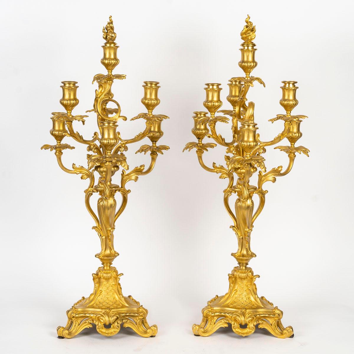 An important pair of Louis XV style gilt bronze candelabra, signed Barbedienne, 19th century.

A pair of Louis XV style 7-branch candelabra in chased and gilt bronze, signed Ferdinand Barbedienne, 19th century, Napoleon III period.
H: 75cm, W: 30cm,