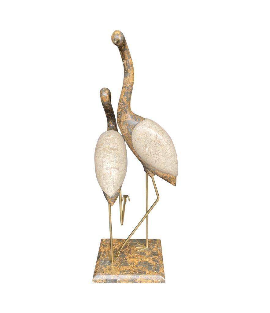 Late 20th Century A large pair of Maitland Smith tessellated marble and brass flamingo sculptures