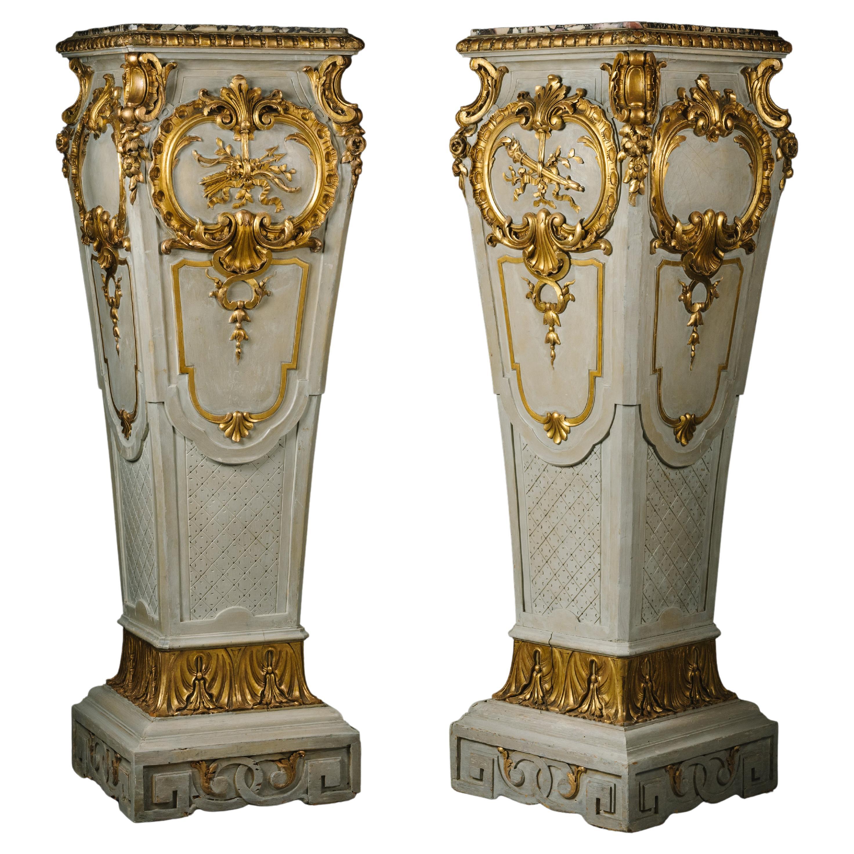 A Large Pair of Parcel-Gilt and Grey Painted Pedestals For Sale