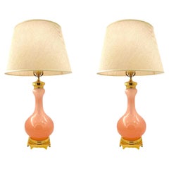 A large pair of Paul Hanson 1950s lamps with pink Murano opaline glass bases