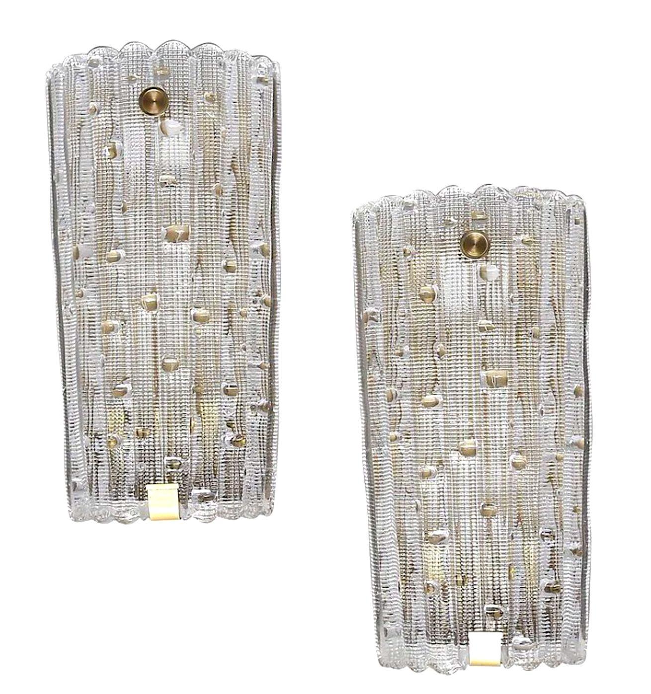 Brass A large pair of Swedish 1960s Orrefors glass wall sconces by Carl Fagerlund For Sale