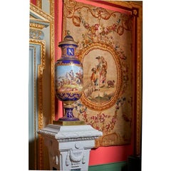 A large pair of white statuary marble with green inlay pedestals