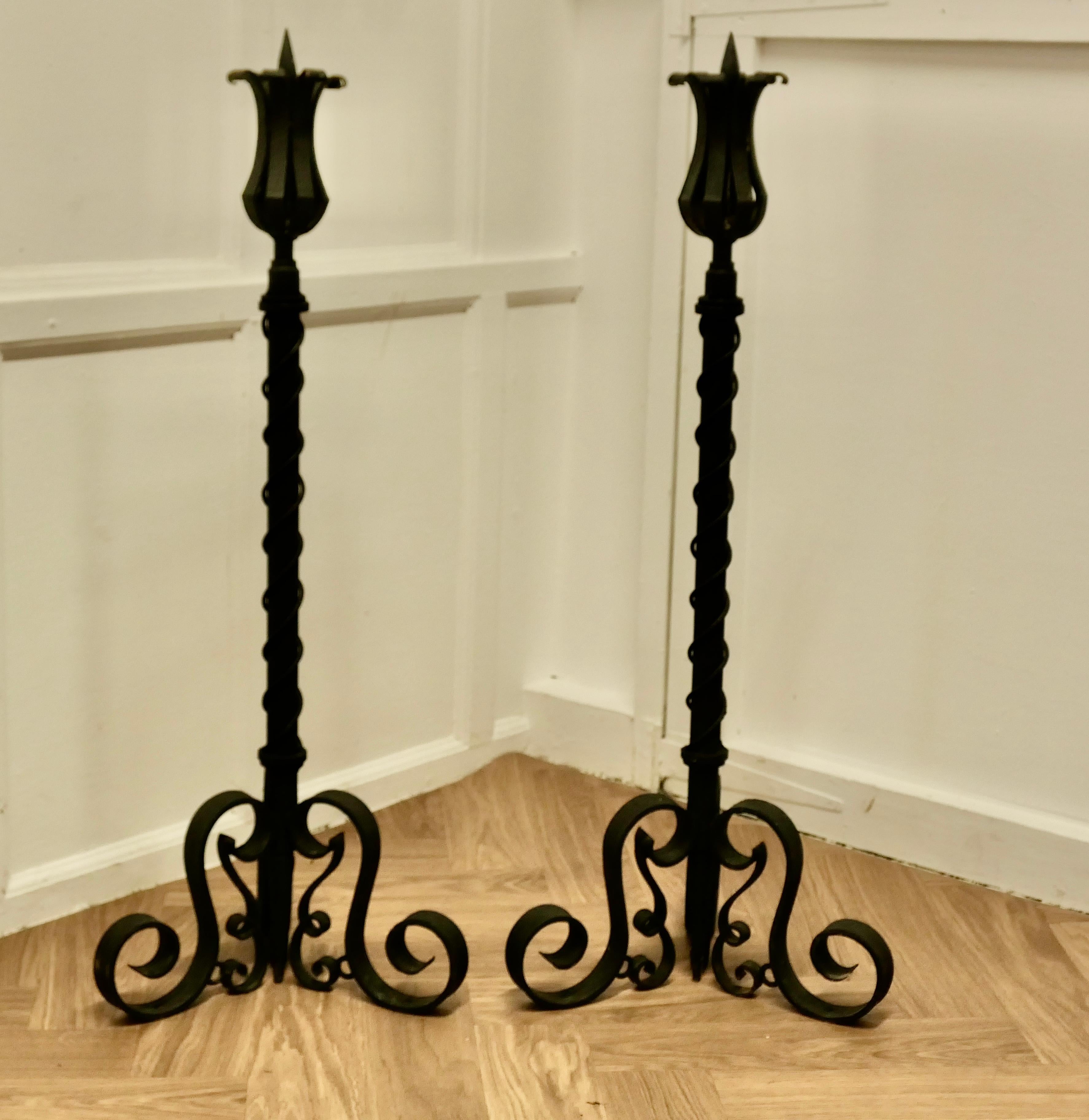 A Large Pair of Wrought Iron Candle Sticks or Torchère

These Tall Torchère when placed on the floor will look very attractive by the fire side
The stands are blacksmith made and very heavy, they are 41” high andat the floor they are 16” square
