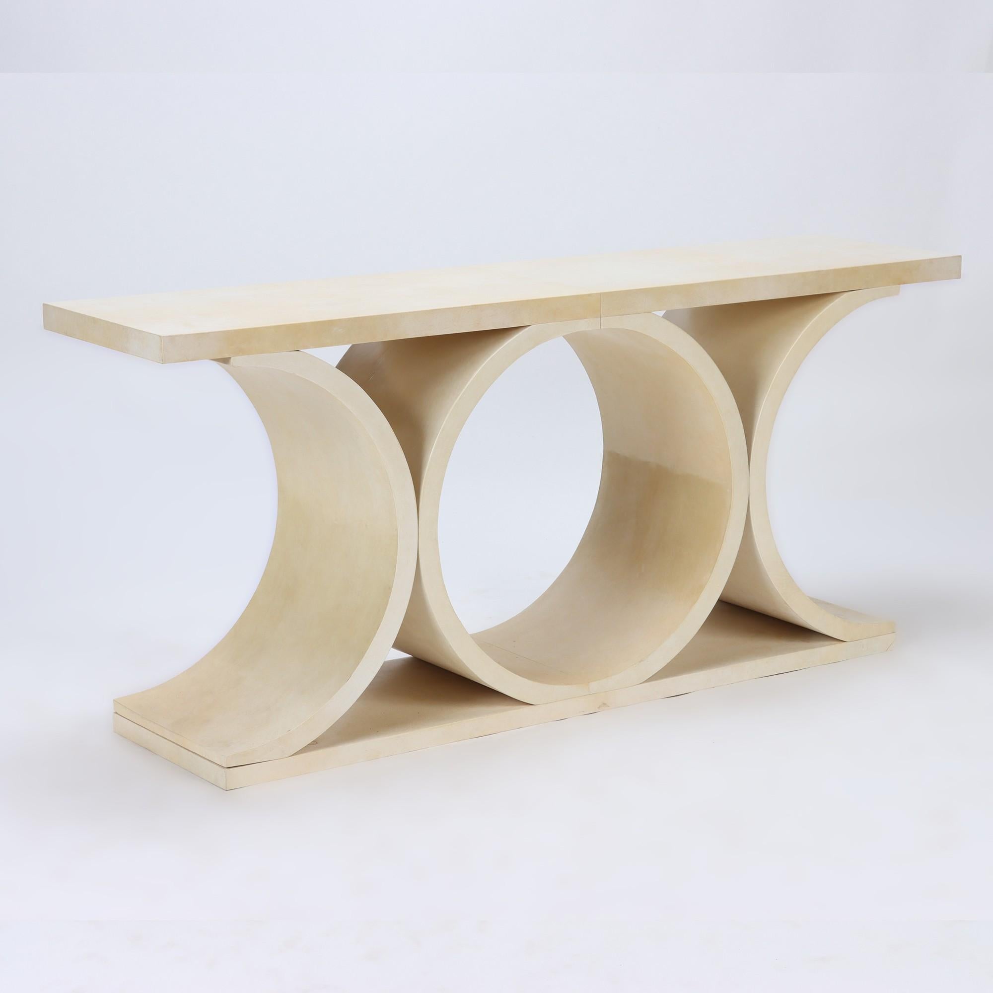 An elegant parchment console table. Contemporary.