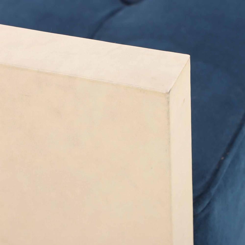 A large parchment covered upholstered bench in the manner of Jean-Michel Frank. In Good Condition In Philadelphia, PA