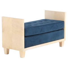 A large parchment covered upholstered bench in the manner of Jean-Michel Frank.