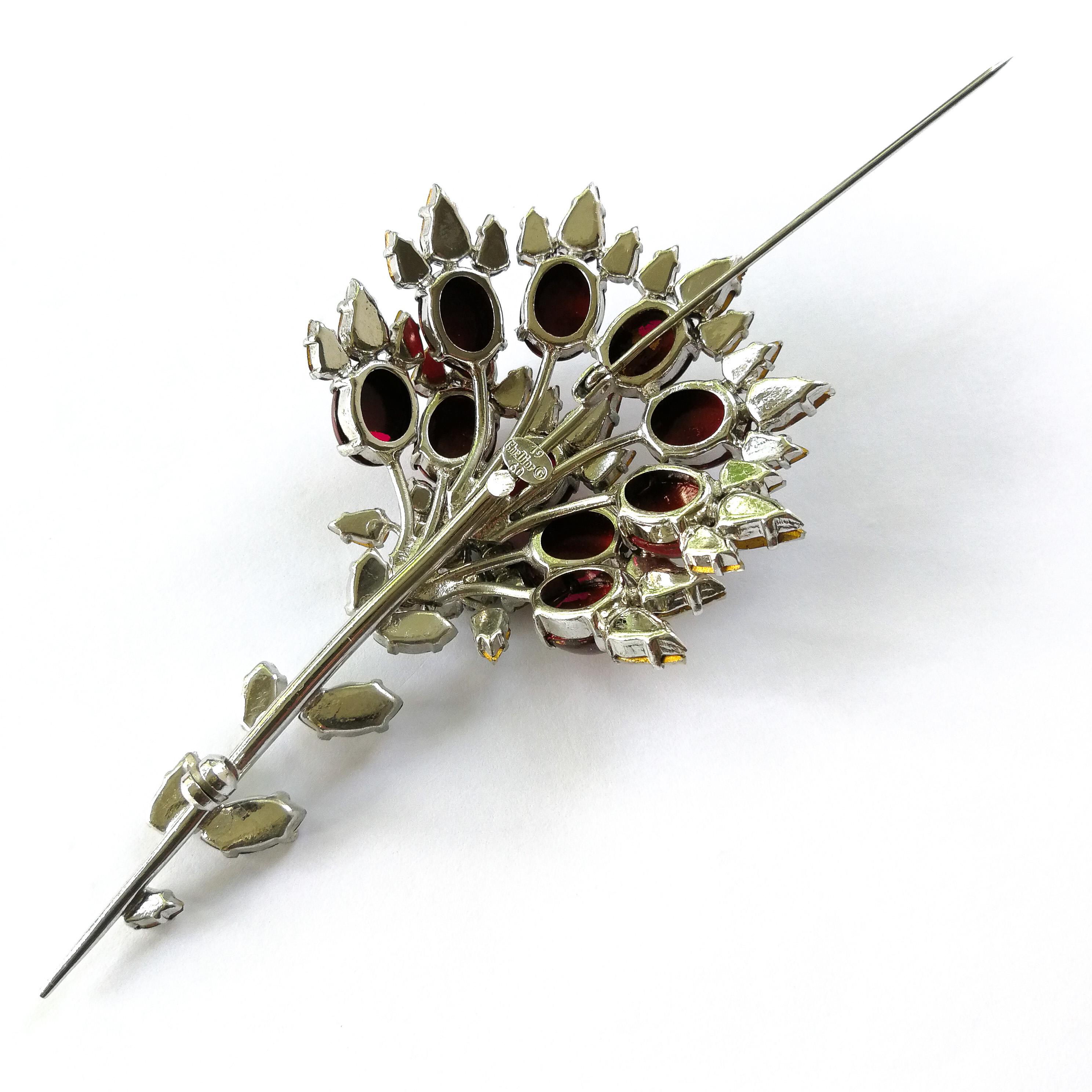 A large paste and cabuchon brooch, Christian Dior, 1960. 1