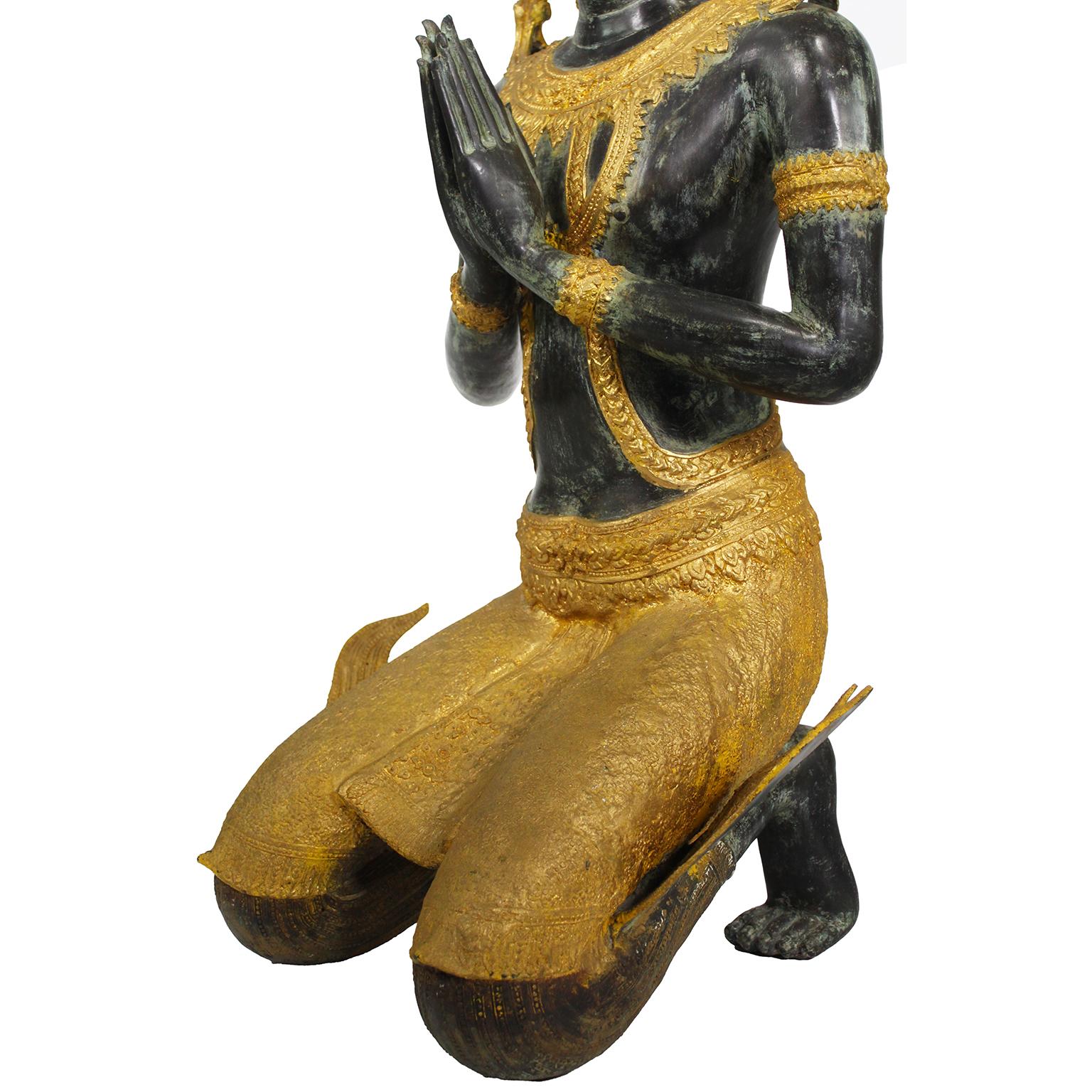 A Large Patinated and Parcel-Gilt-Bronze Thai Thepphanom Kneeling Angel Buddha For Sale 6