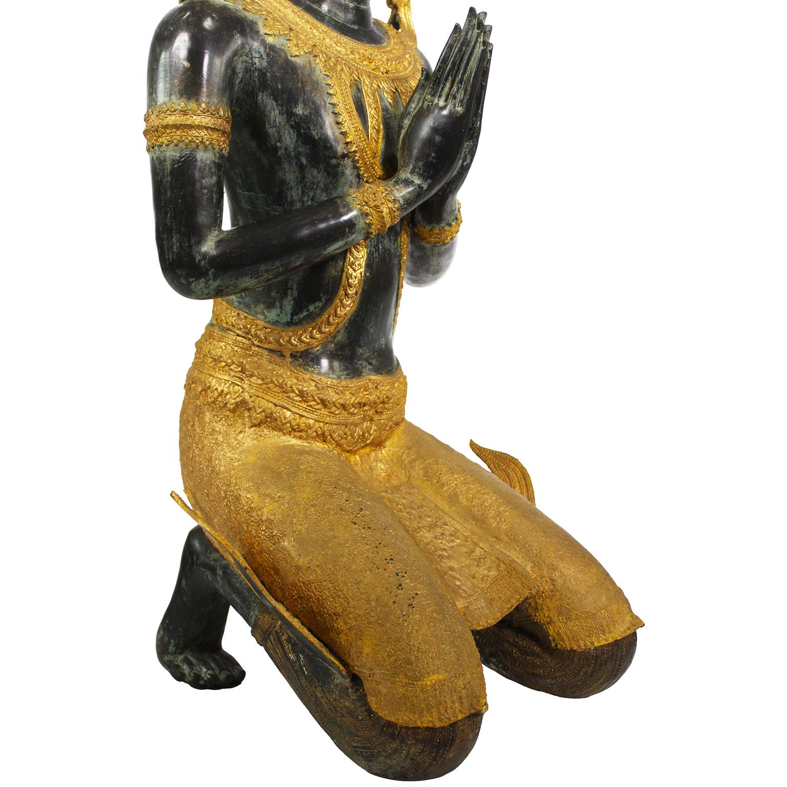 A Large Patinated and Parcel-Gilt-Bronze Thai Thepphanom Kneeling Angel Buddha For Sale 7