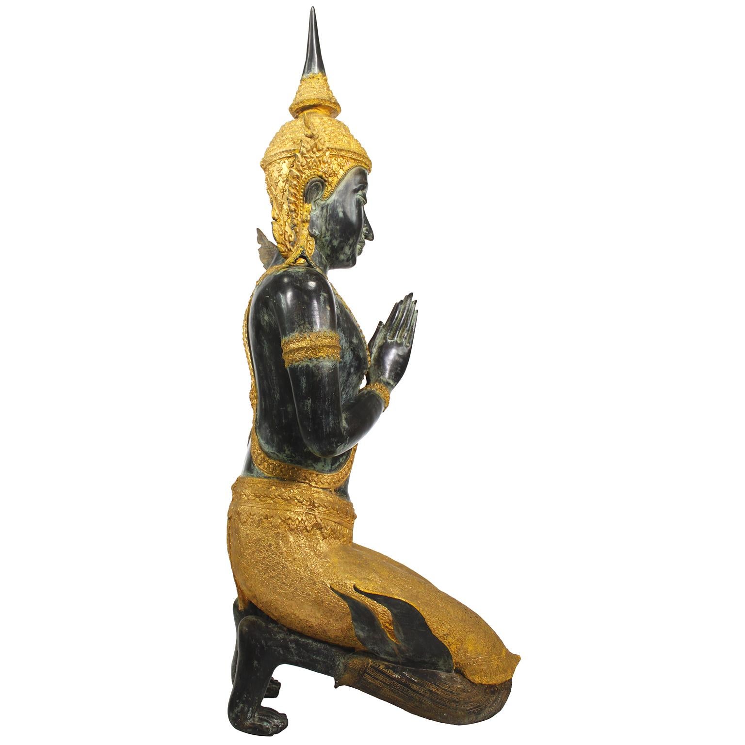 A Large Patinated and Parcel-Gilt-Bronze Thai Thepphanom Kneeling Angel Buddha For Sale 1