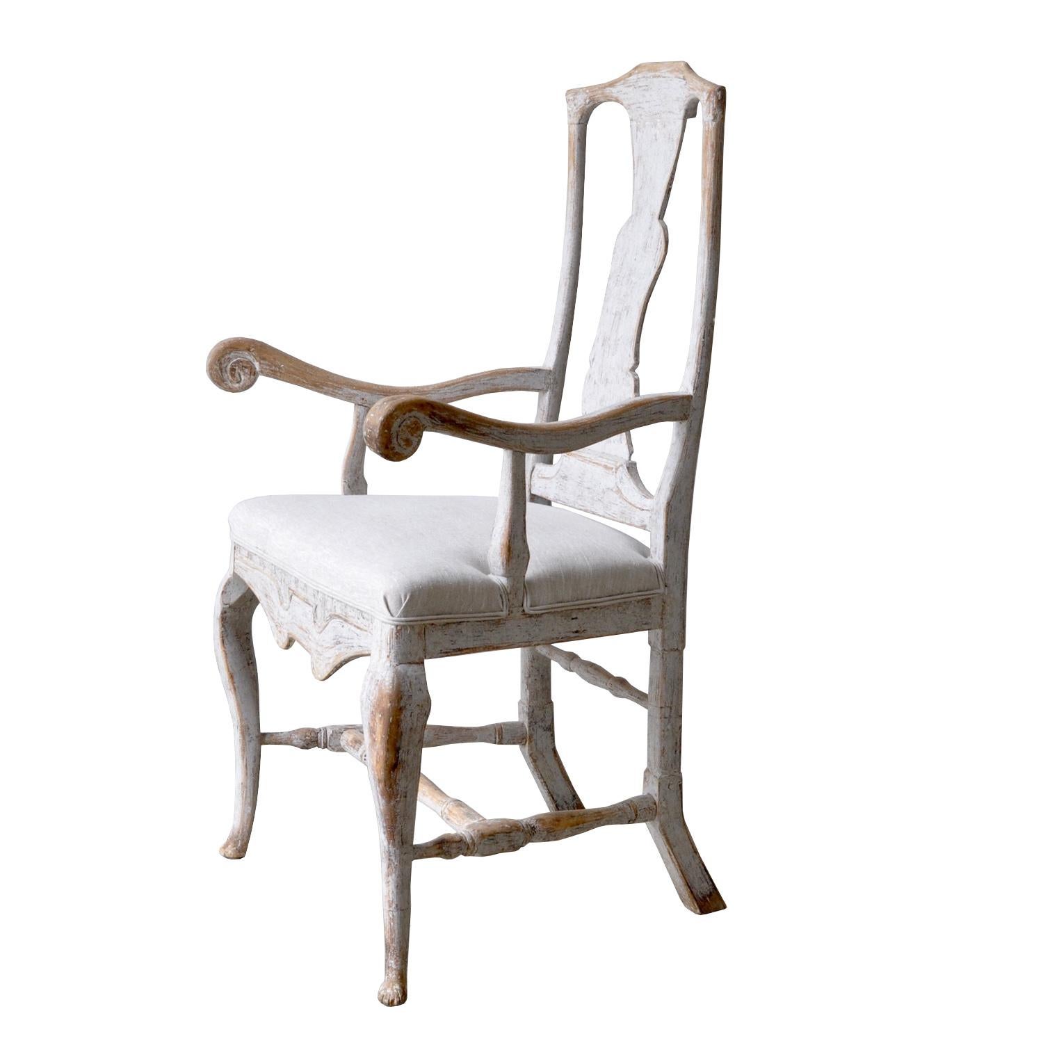 A large period Baroque armchair reupholstered in Belgium linen, and repainted in soft grey.