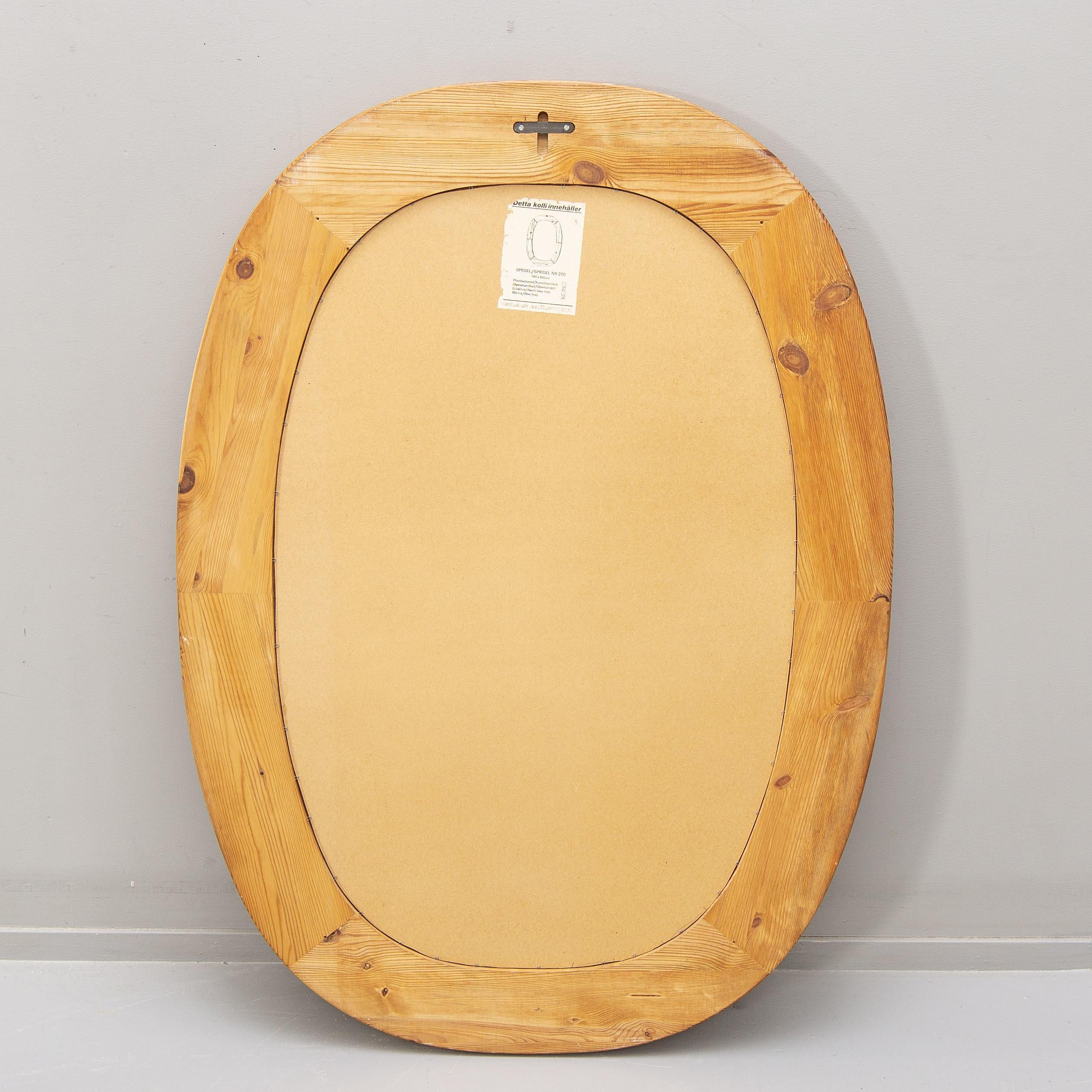 A large oval XXL (140 cm height) pine wood Mirror by Glasmaster, Sweden, 1960.
Tag of cabinet maker on the back.
Good condition.