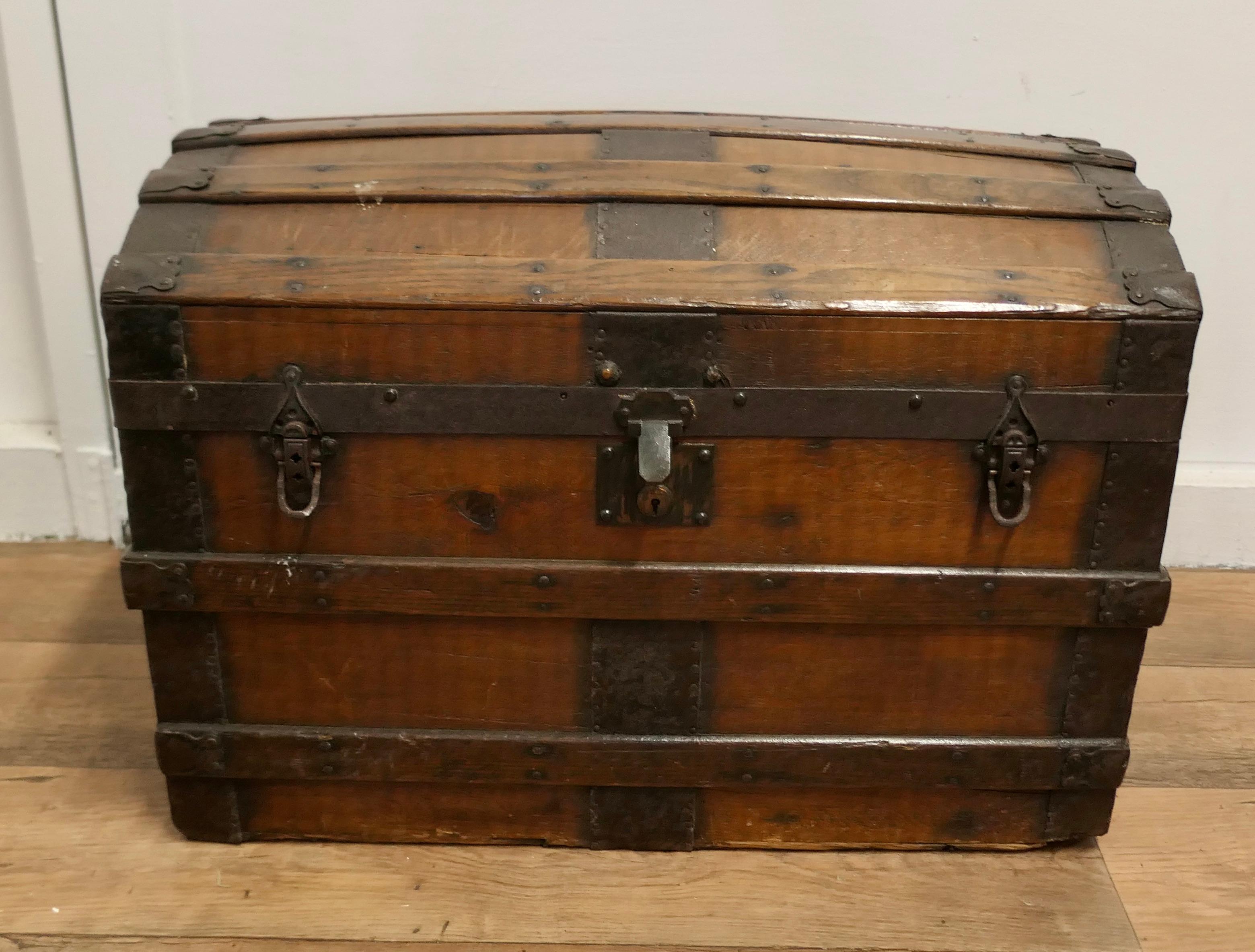 Arts and Crafts A Large Polished Oak and Pine Dome Top Chest    This is a very attractive chest 