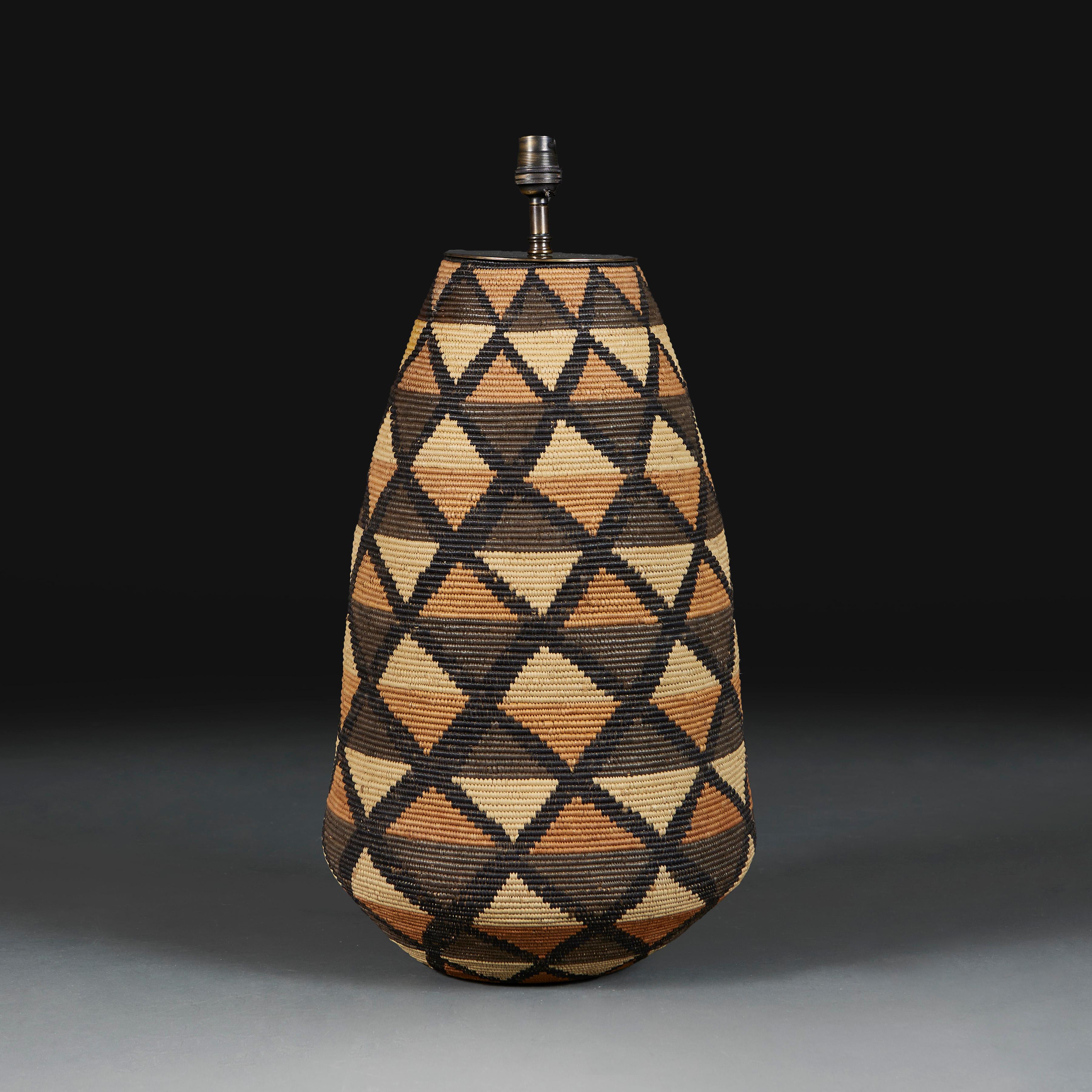 South African A large raffia woven basket vase as a lamp For Sale