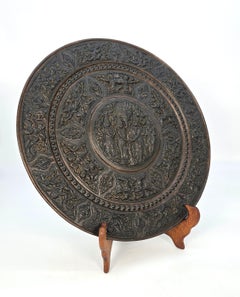 A large Raj period Indian brass and copper repousse work charger circa 1900