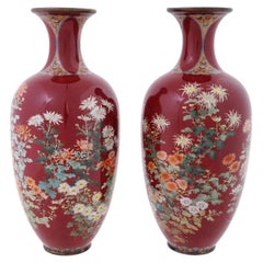 A Large Rare Pair Of Red Japanese Cloisonne Enamel Vases Gardens in Bloom Kawade
