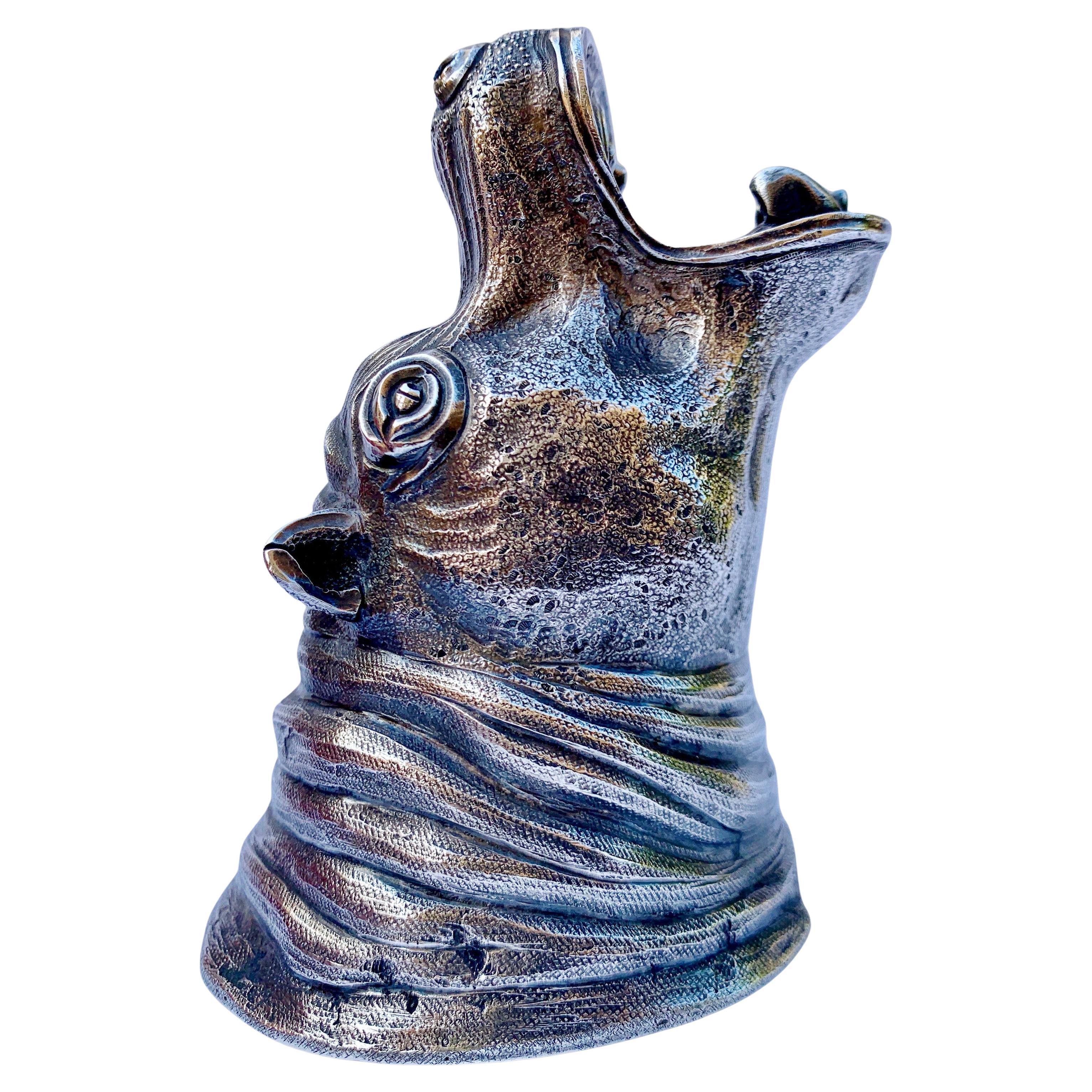 Un grande e raro accendino/porta sigari "ippopotamo" in argento di G. Fiorentini, 20° sec.