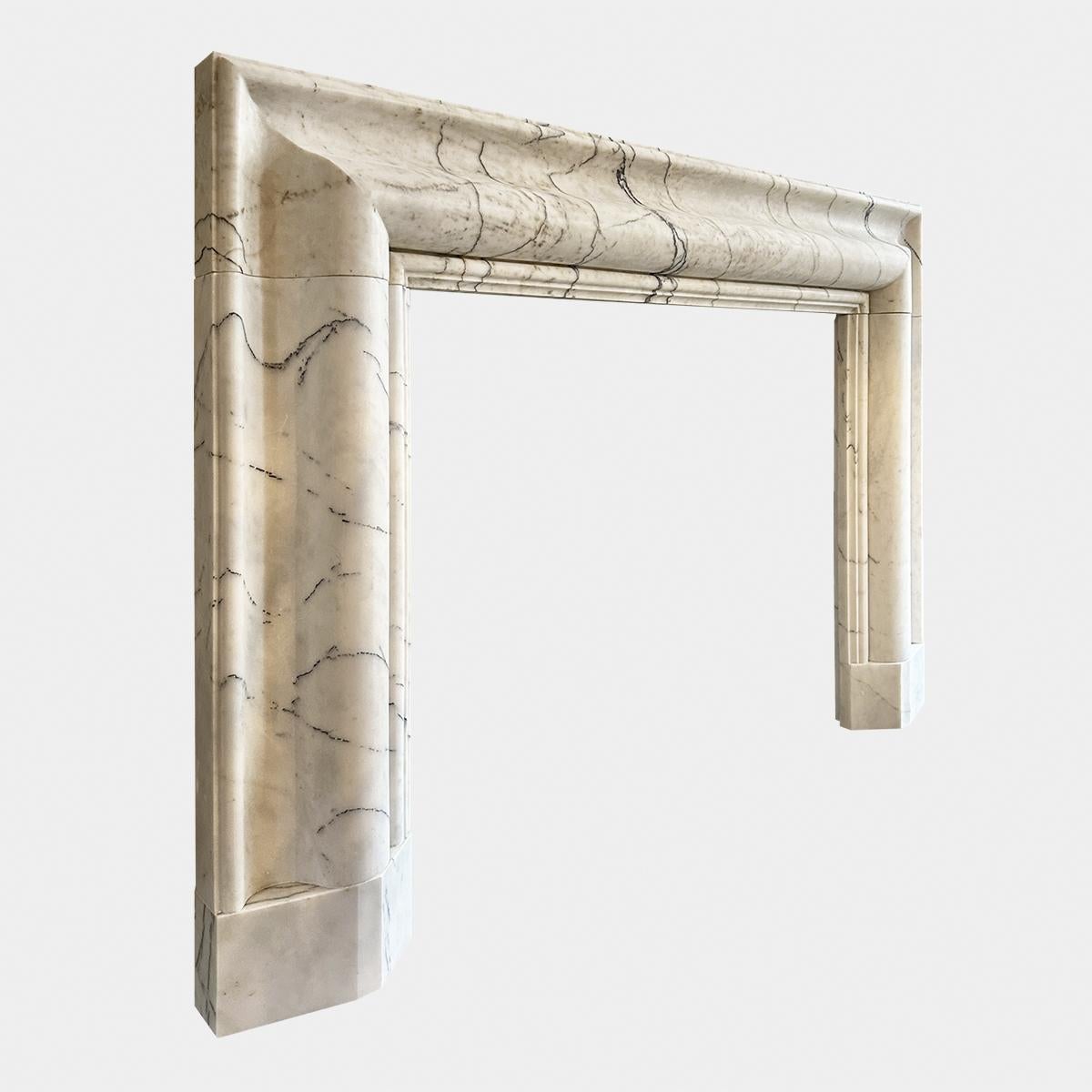 Carved A large Reclaimed Calacatta Vagli Marble Bolection Fireplace Mantle  For Sale
