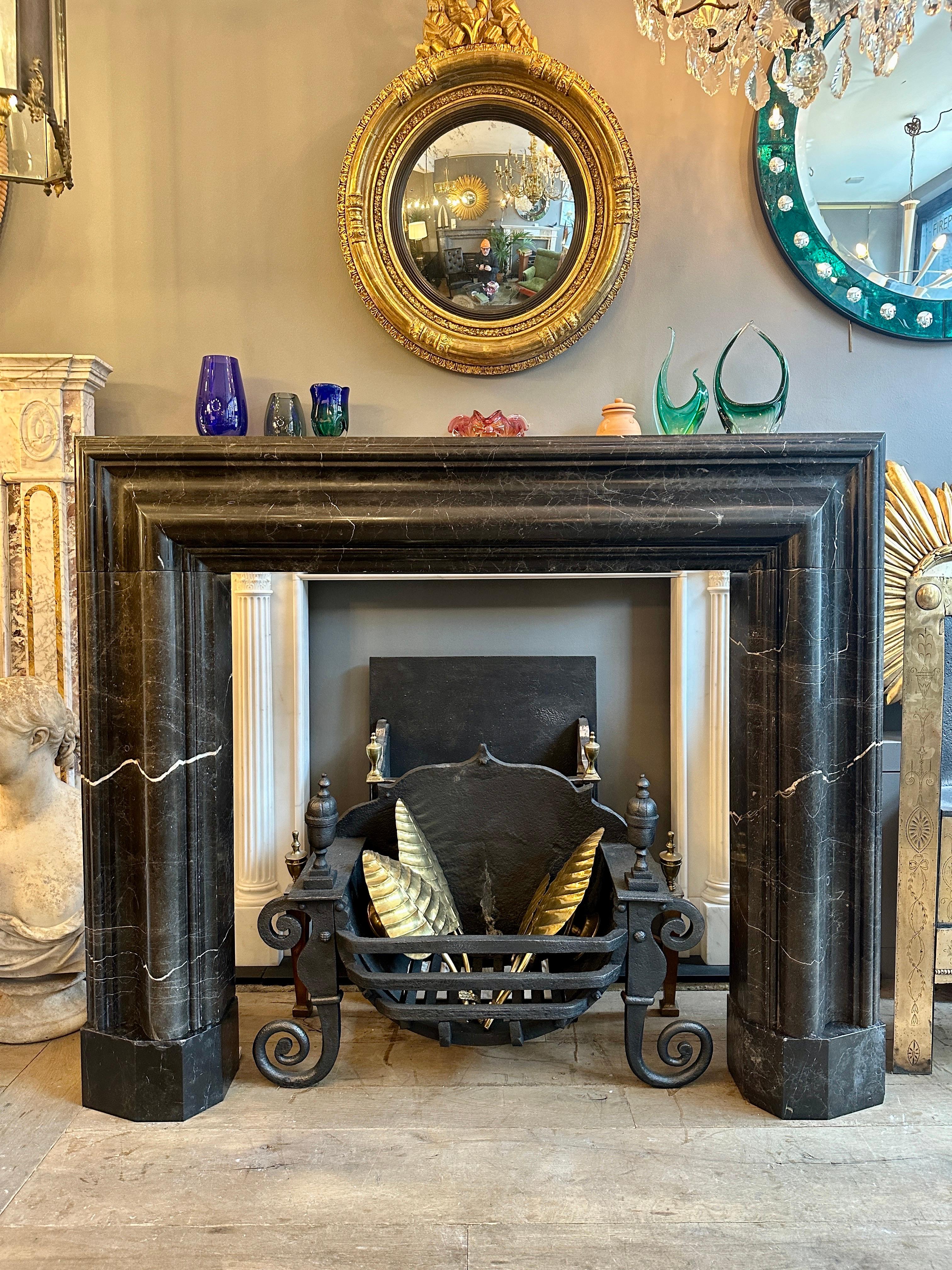 A Large Reclaimed Black Marble Bolection Fireplace Mantel For Sale 4