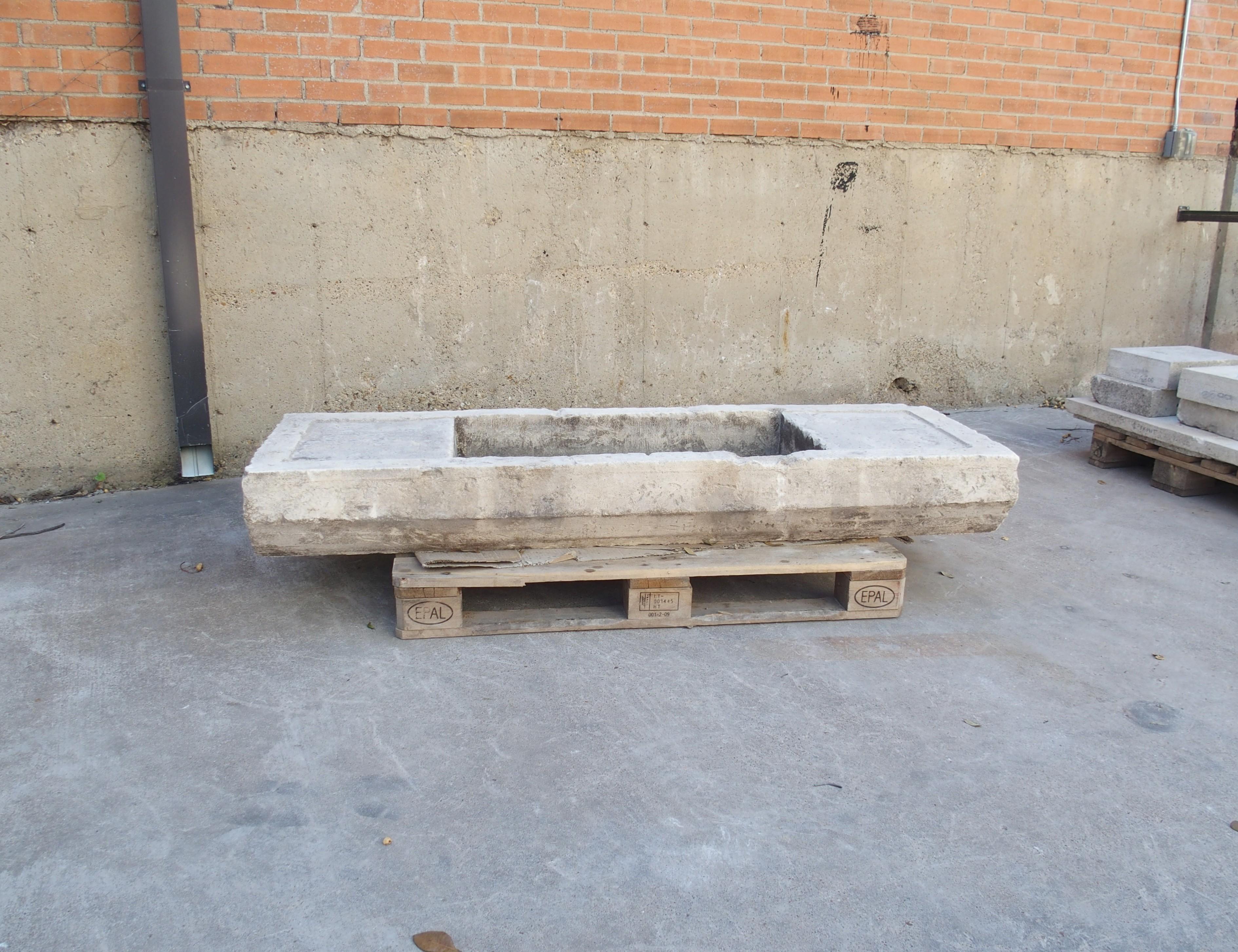 Measuring almost six feet in length, this reconstituted limestone basin would make a wonderful farm sink. Originally from Southern Italy, the base material is Lecce limestone, which has been pulverized, mixed with a binding agent. The stone retains