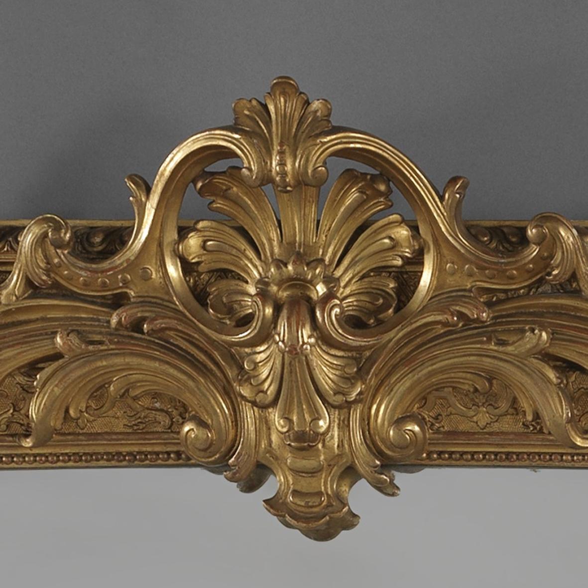 French A Large Regence Style Carved Giltwood and Gesso Mirror, Circa 1860 For Sale