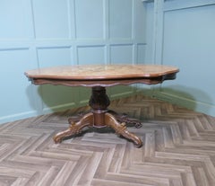 A Large Regency Style Birdseye Veneer Coffee Table