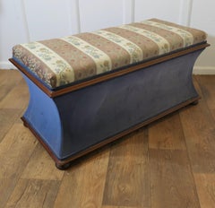 A Large Regency Waisted Upholstered Ottoman or Window Seat
