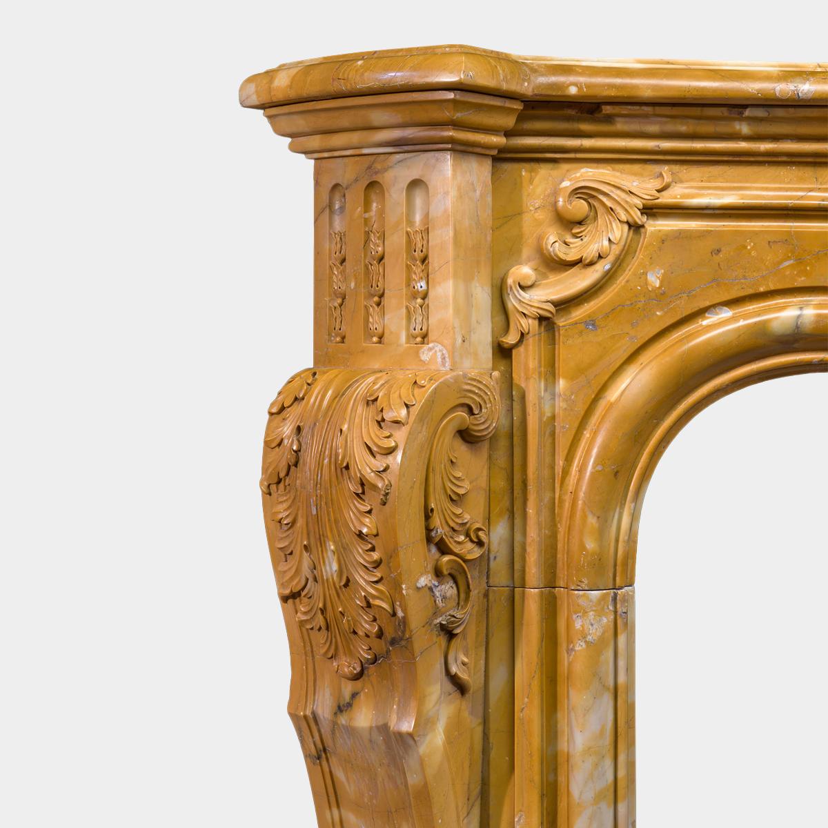 20th Century A Large Rococo Carved Siena Marble Fireplace Mantel For Sale
