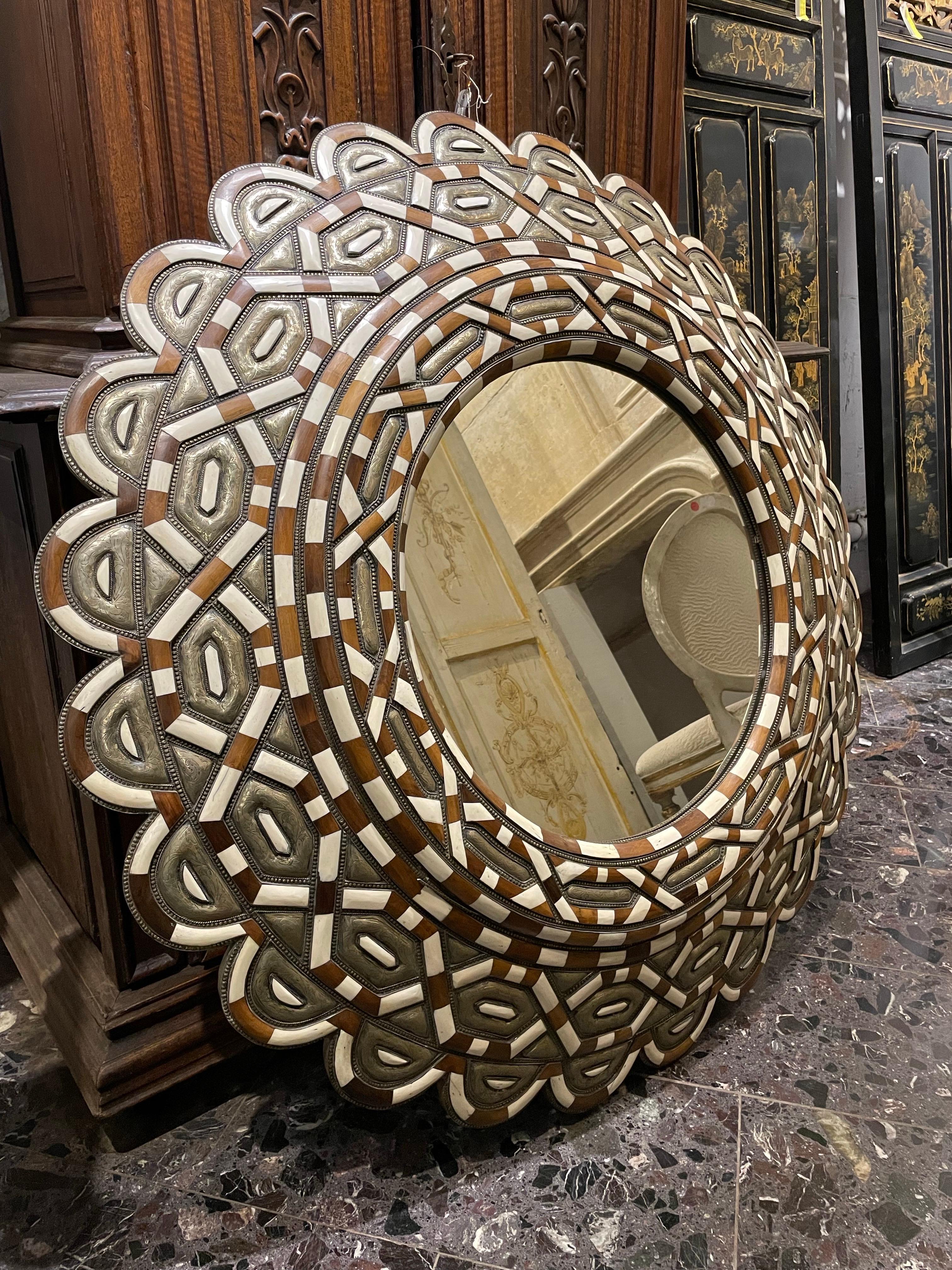 A Large Round Moroccan Style Mirror

With timber and pressed metal inlay. Home decor and interior design.

Provenance: Private Victoria Collection.

Dimensions:
Diameter: 130cm.
Height: 10cm.