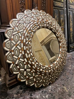 A Large Round Moroccan Style Mirror