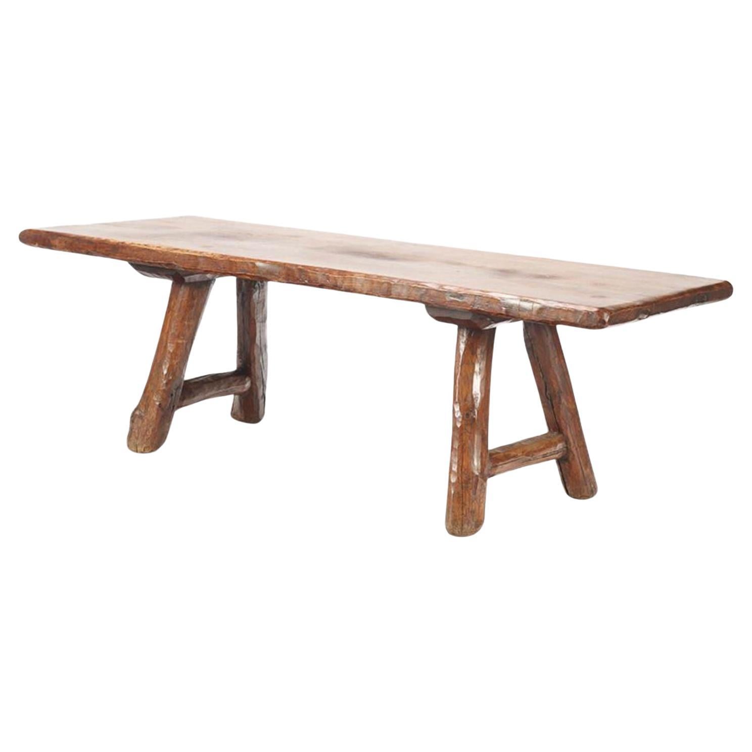 A large rustic modern French farm table circa 1940. For Sale