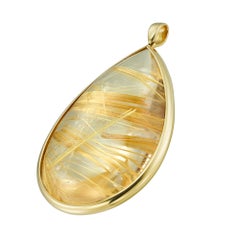 A large rutilated quartz drop pendant