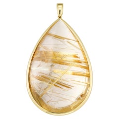A large rutilated quartz drop pendant