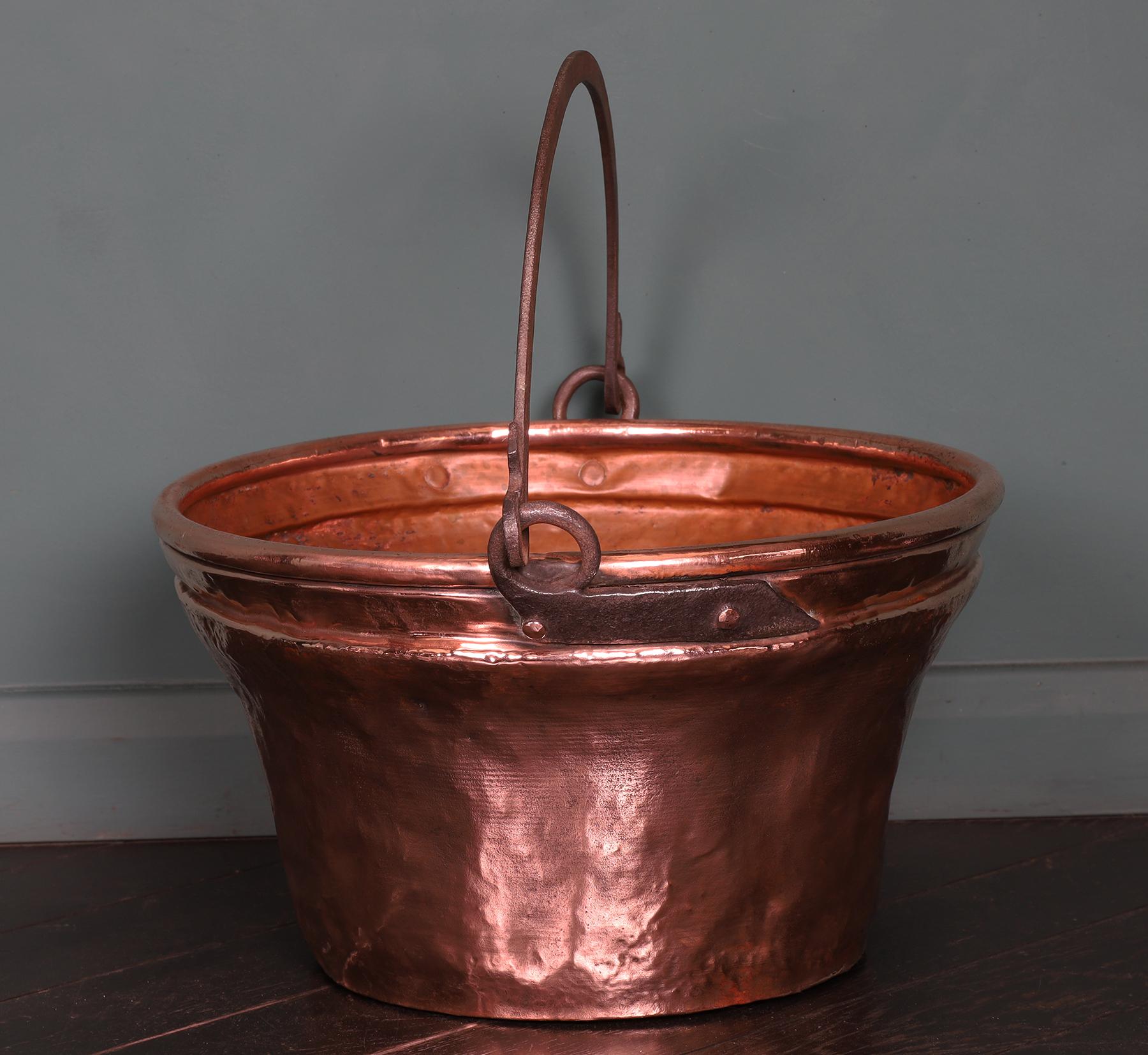 A large scale Arts & Crafts copper & wrought log/coal scuttle in fine condition. The copper scuttle with a shaped fold-down wrought-iron handle. Suitable for storing coal, logs and kindling. Restored.
Circa 1880