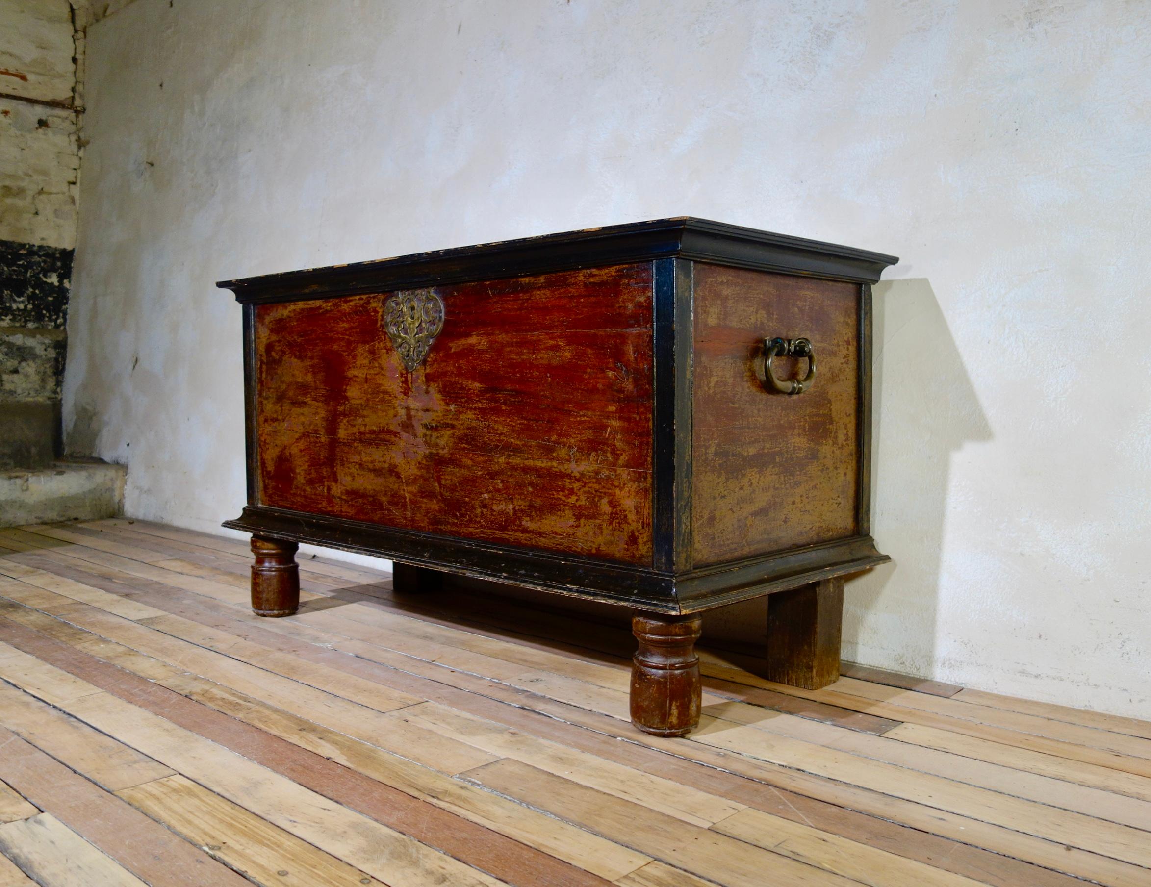 A 19th century Indo Dutch chest or trunk of large proportions. In an exotic hardwood featuing heavy original brasswork.
 
Measures: 87cm high,
153cm wide
70cm deep.