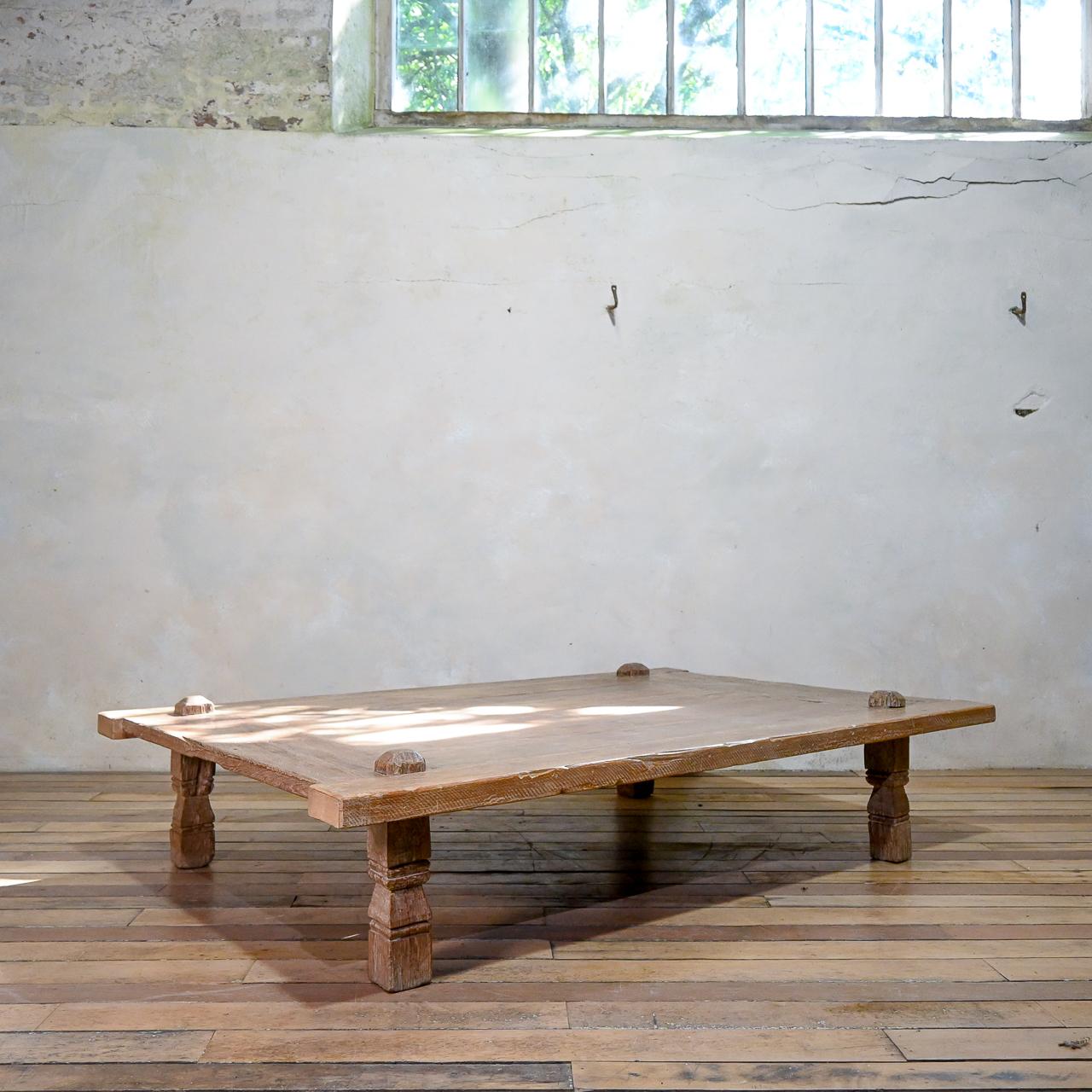 A large-scale late 19th century Javanese Weavers Table. originating from Madura off of the north-eastern coast of Java during the early 19th century. The table displays an array of carved detailing to the legs. Indonesian weavers would sit atop this