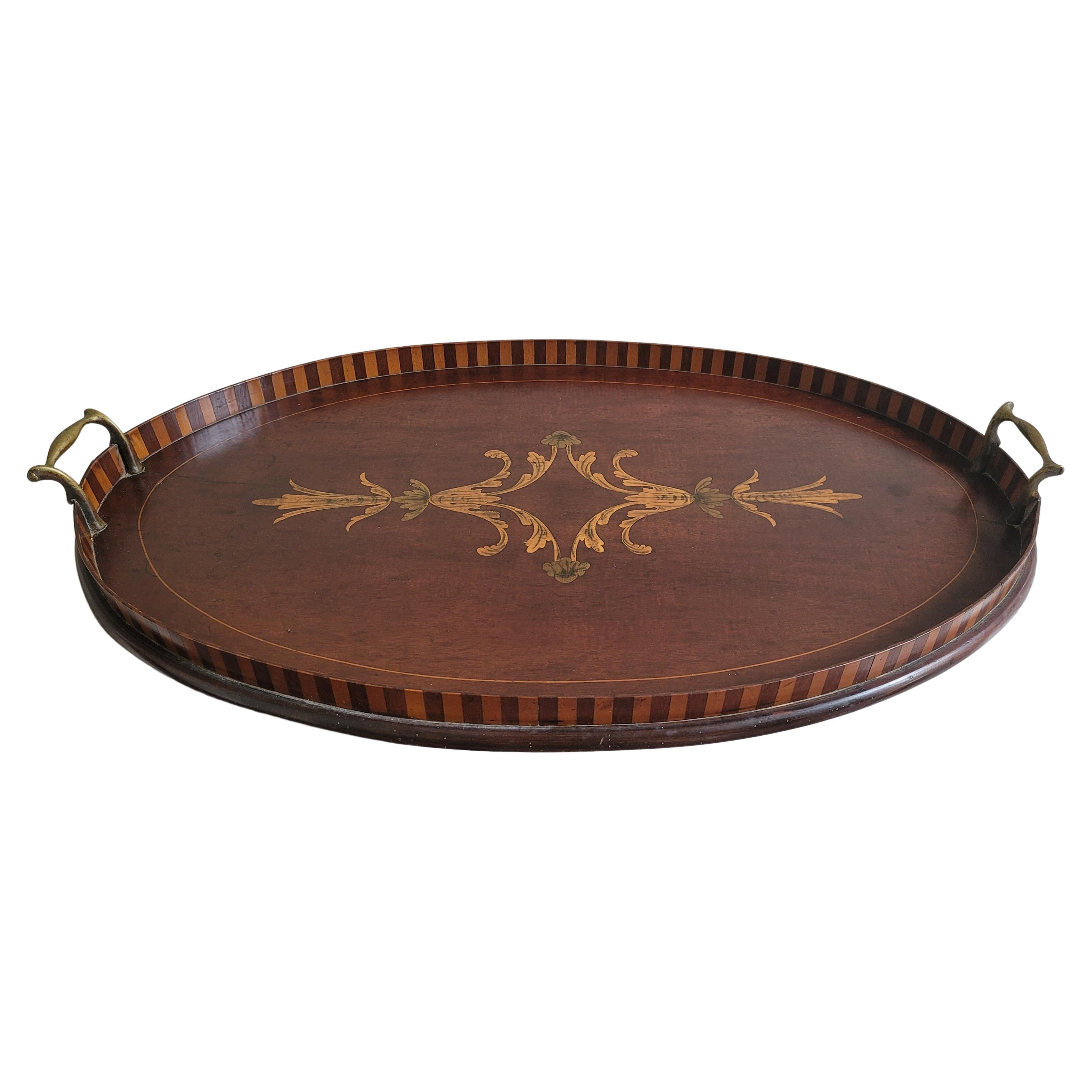 A Large Victorian period George III style Inlaid Mahogany two handle galleried oval tray. Solid brass handles.
Good antique condition with patina. Measures 26