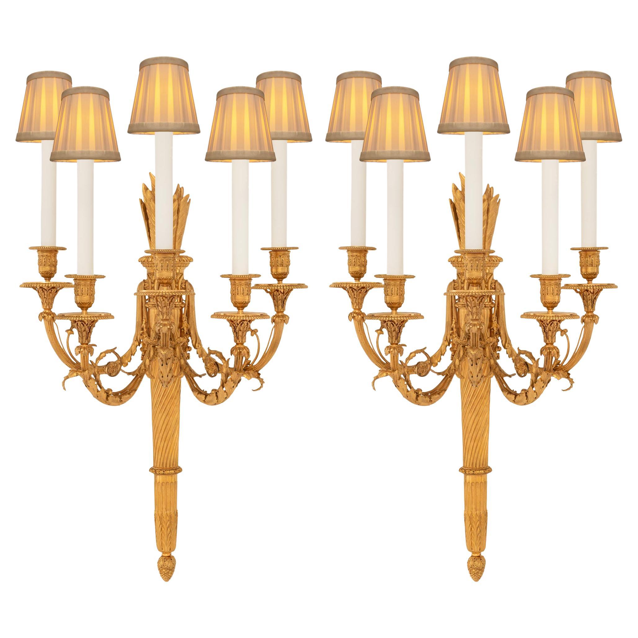 A large scaled pair of French 19th century Louis XVI st. Ormolu sconces