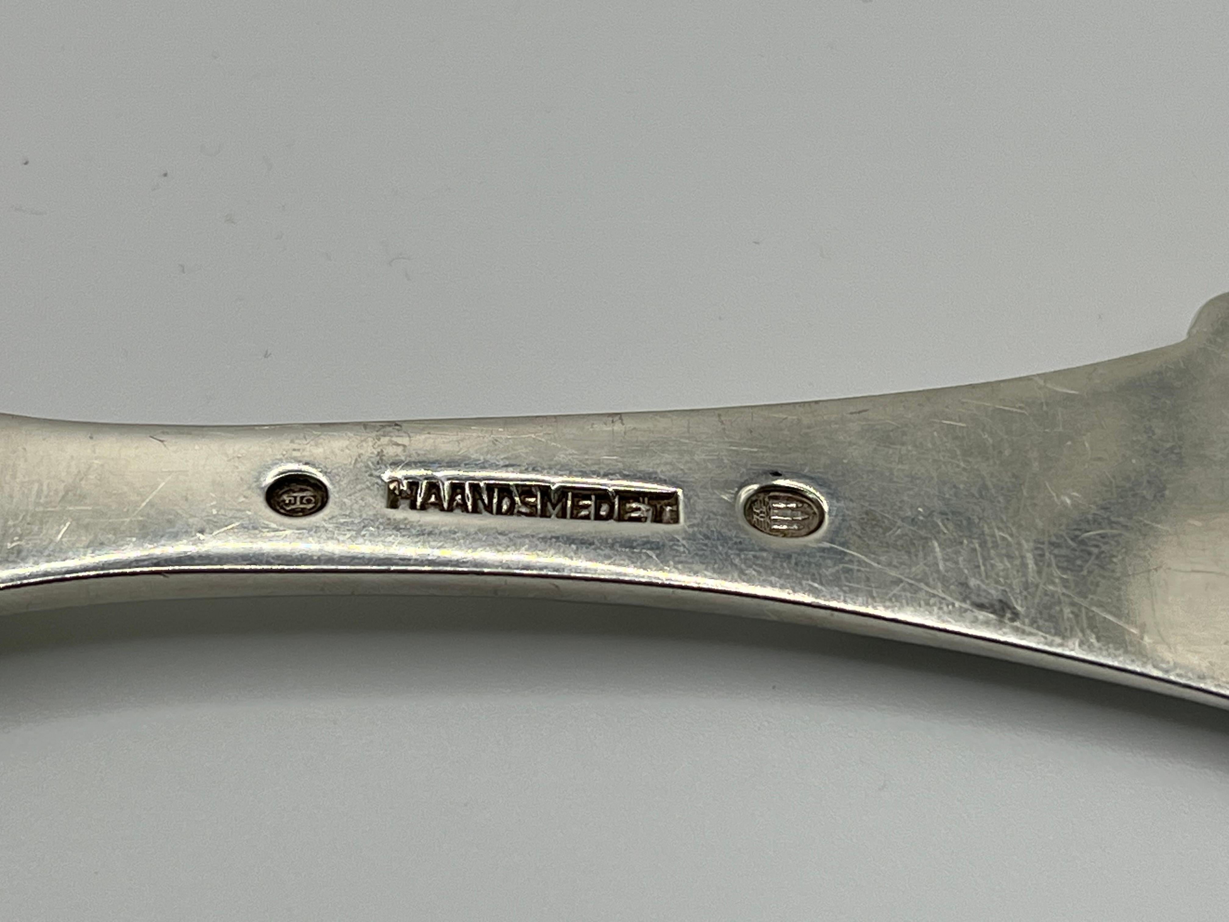 A Large Serving Spoon by Carl M. Cohr Hammered Sterling Silver In Good Condition For Sale In St.Petersburg, FL