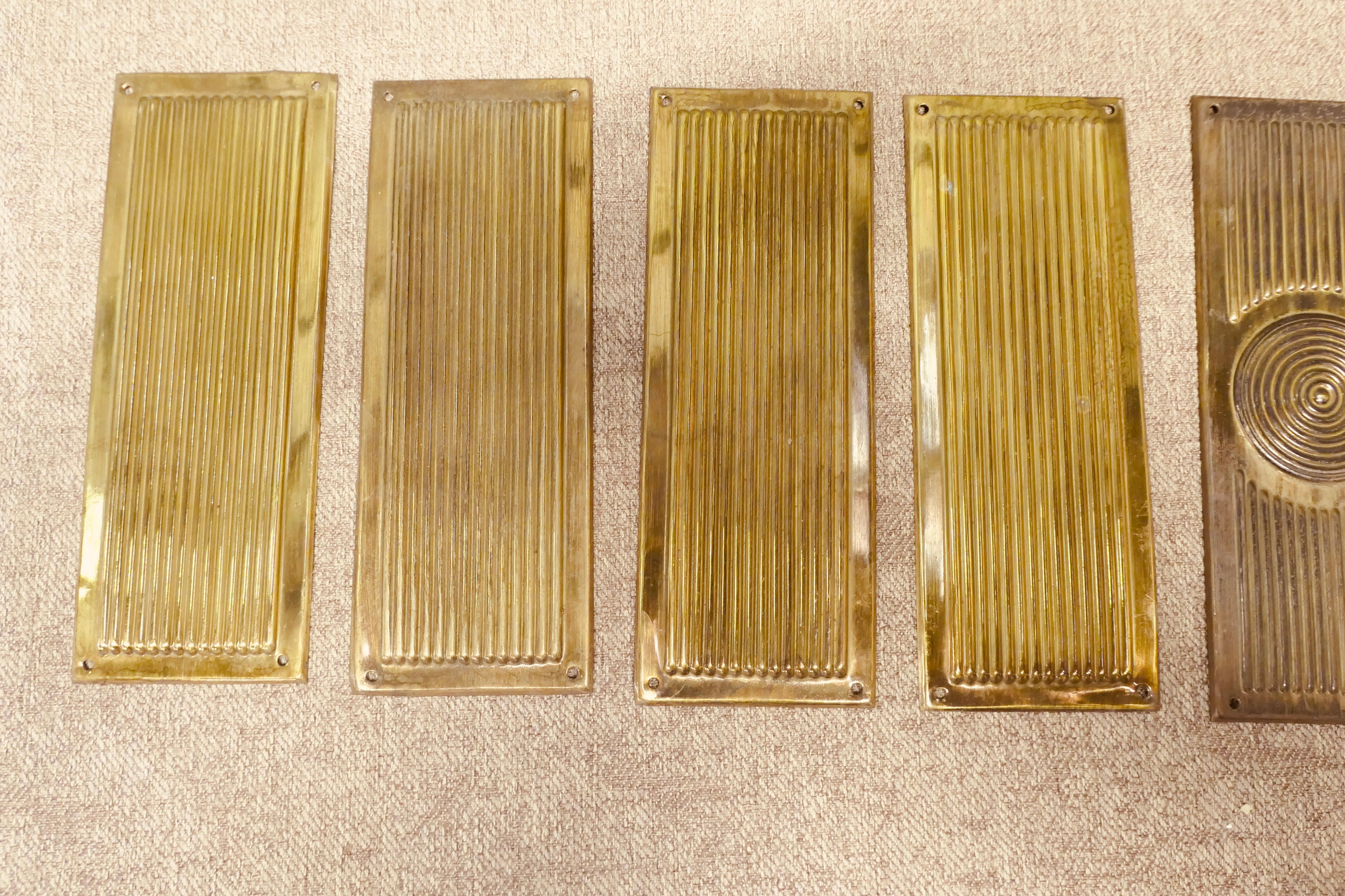 Early 20th Century A Large Set of 12 Art Deco Brass Door Finger Plates For Sale