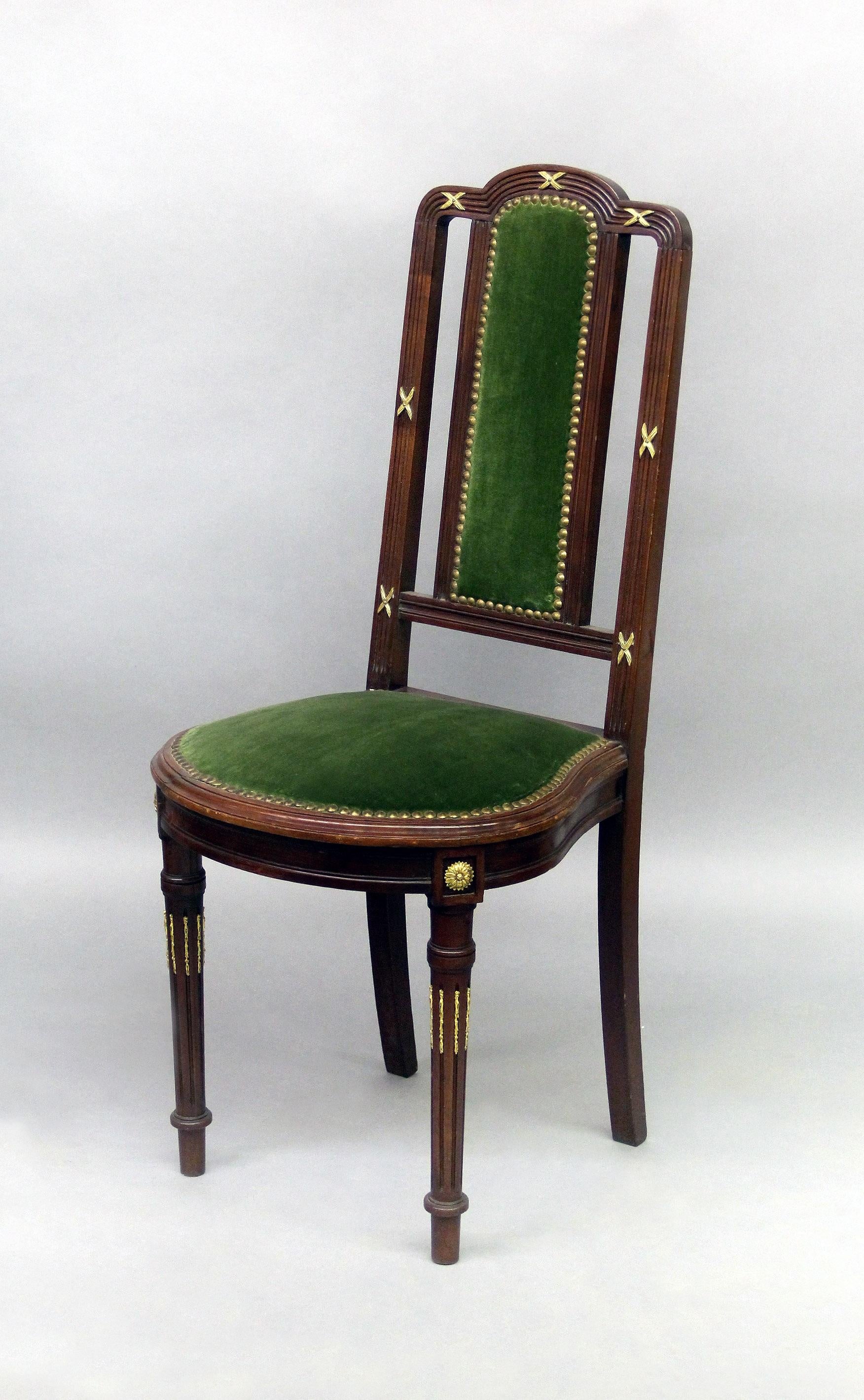 A Large Set of Fourteen 19th Century Gilt Bronze Mounted Dining Chairs In Good Condition For Sale In New York, NY