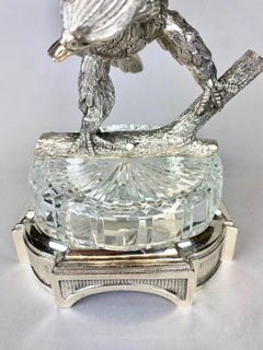 A large silver plated centerpiece bowl with a finely cut Baccarat crystal bowl