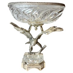 A large silver plated centerpiece bowl with a finely cut Baccarat crystal bowl