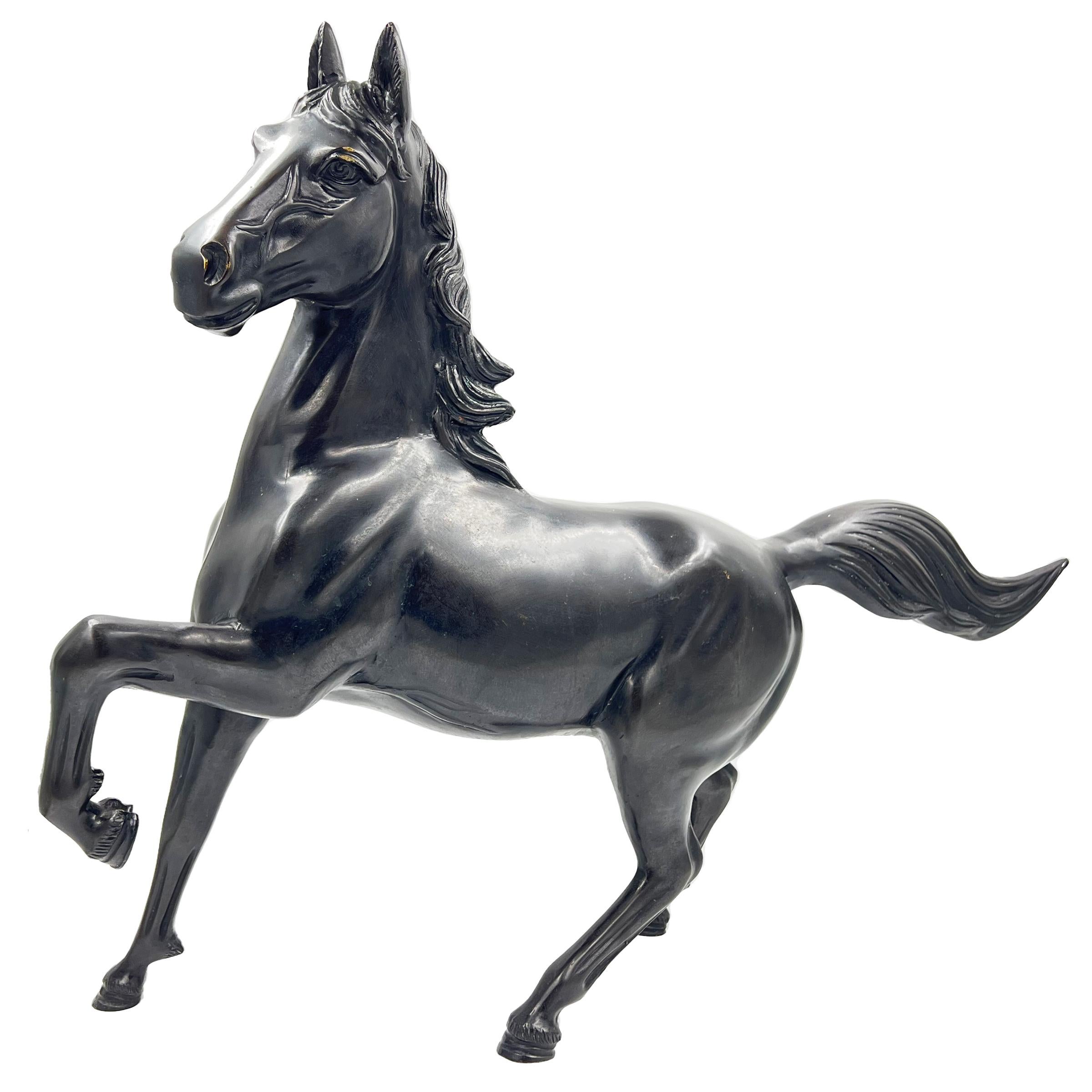 In a cantering pose large Japanese bronze sculpture, Taisho/Showa period, engraved signature to the under side. 
