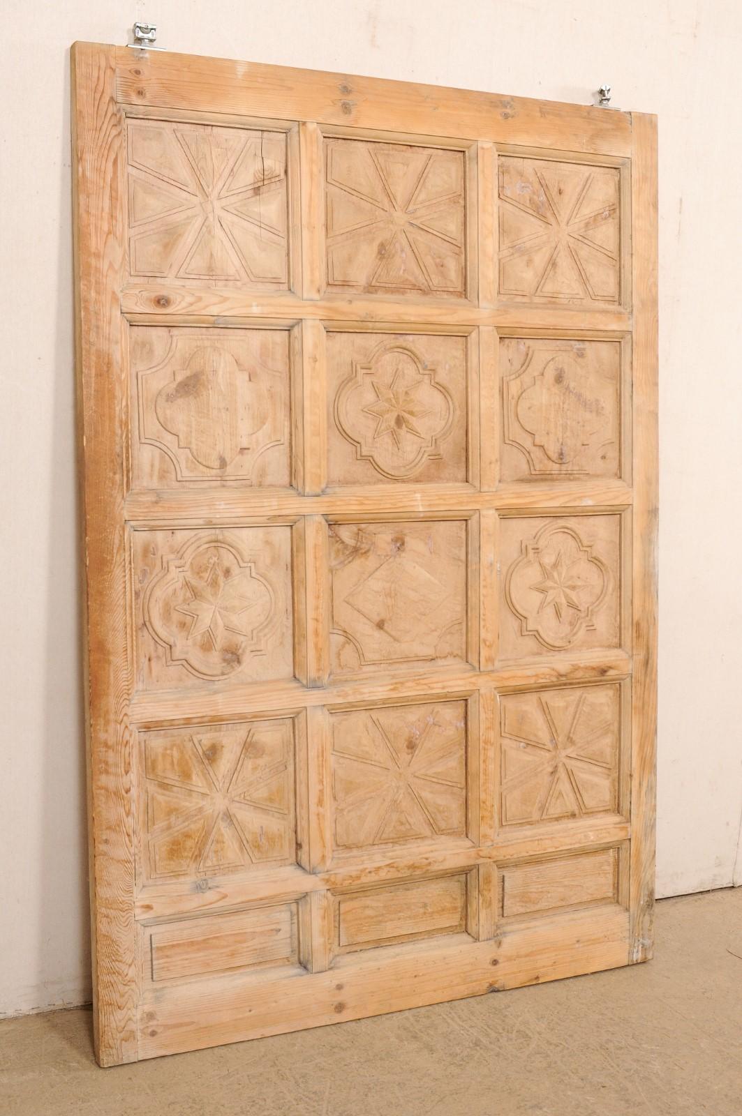 A Large-Sized Spanish Wooden Door w/Decoratively Carved Panels For Sale 6