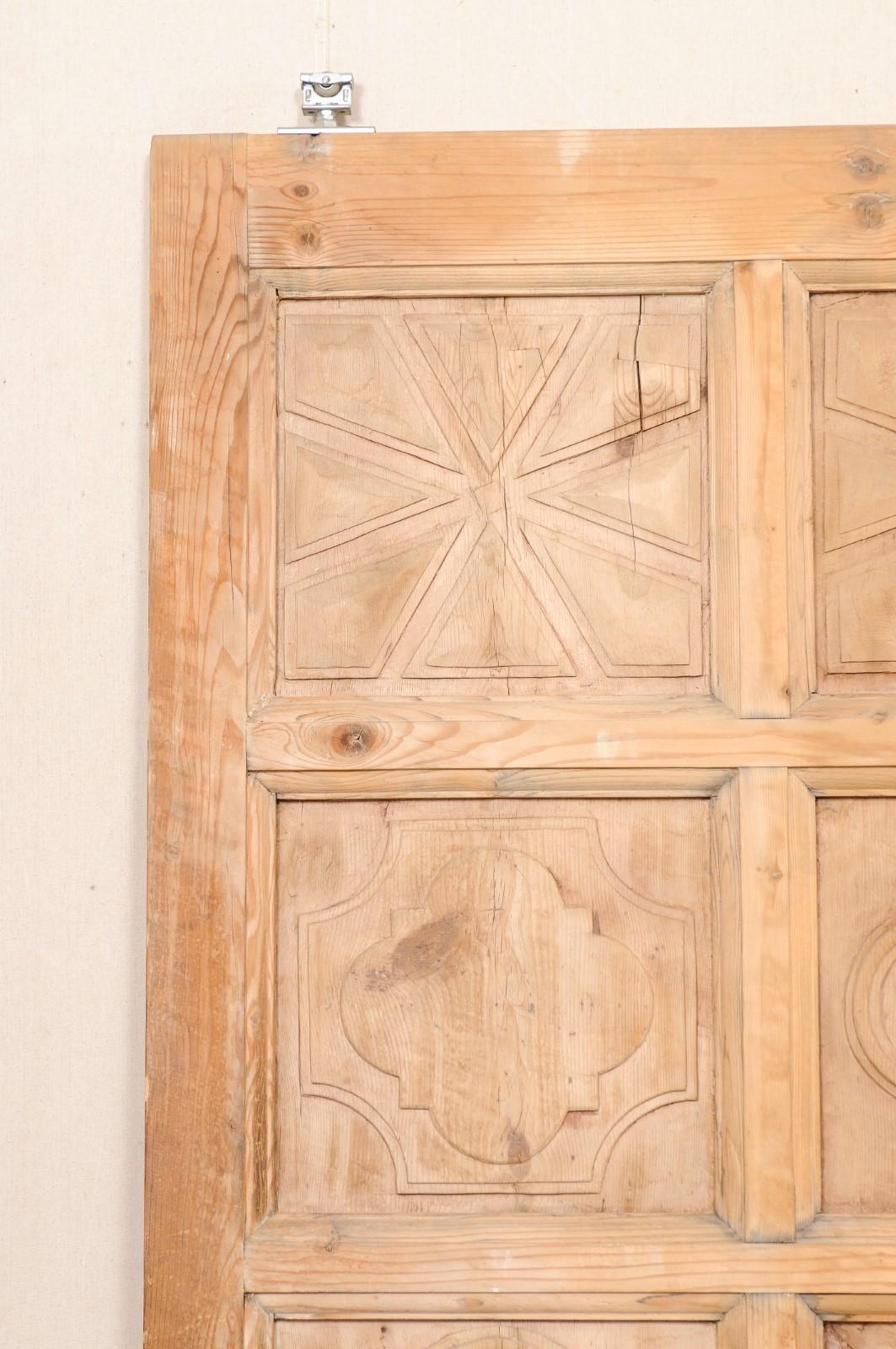 A Large-Sized Spanish Wooden Door w/Decoratively Carved Panels For Sale 4