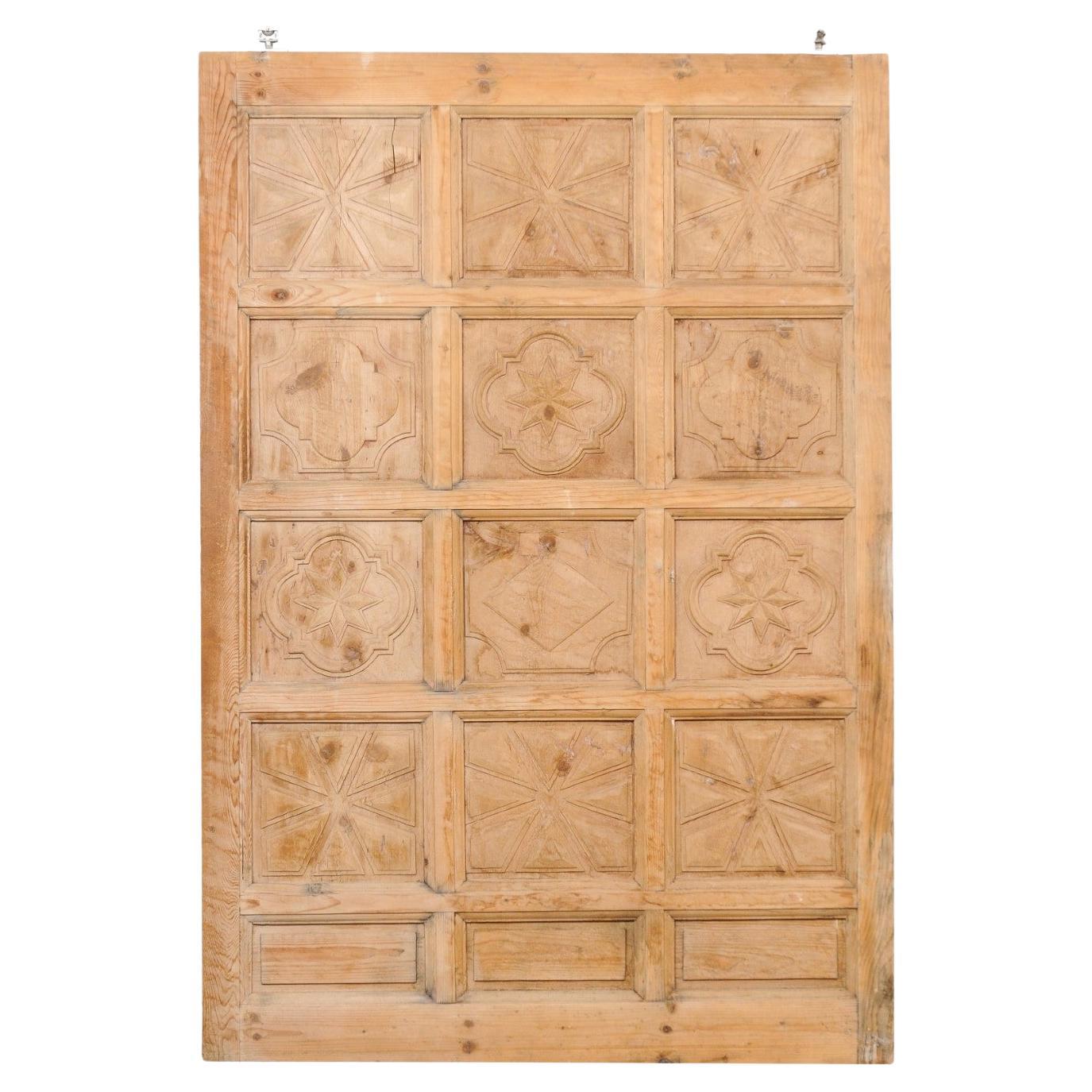 A Large-Sized Spanish Wooden Door w/Decoratively Carved Panels For Sale