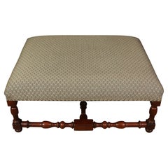 A Large Square Upholstered Ottoman