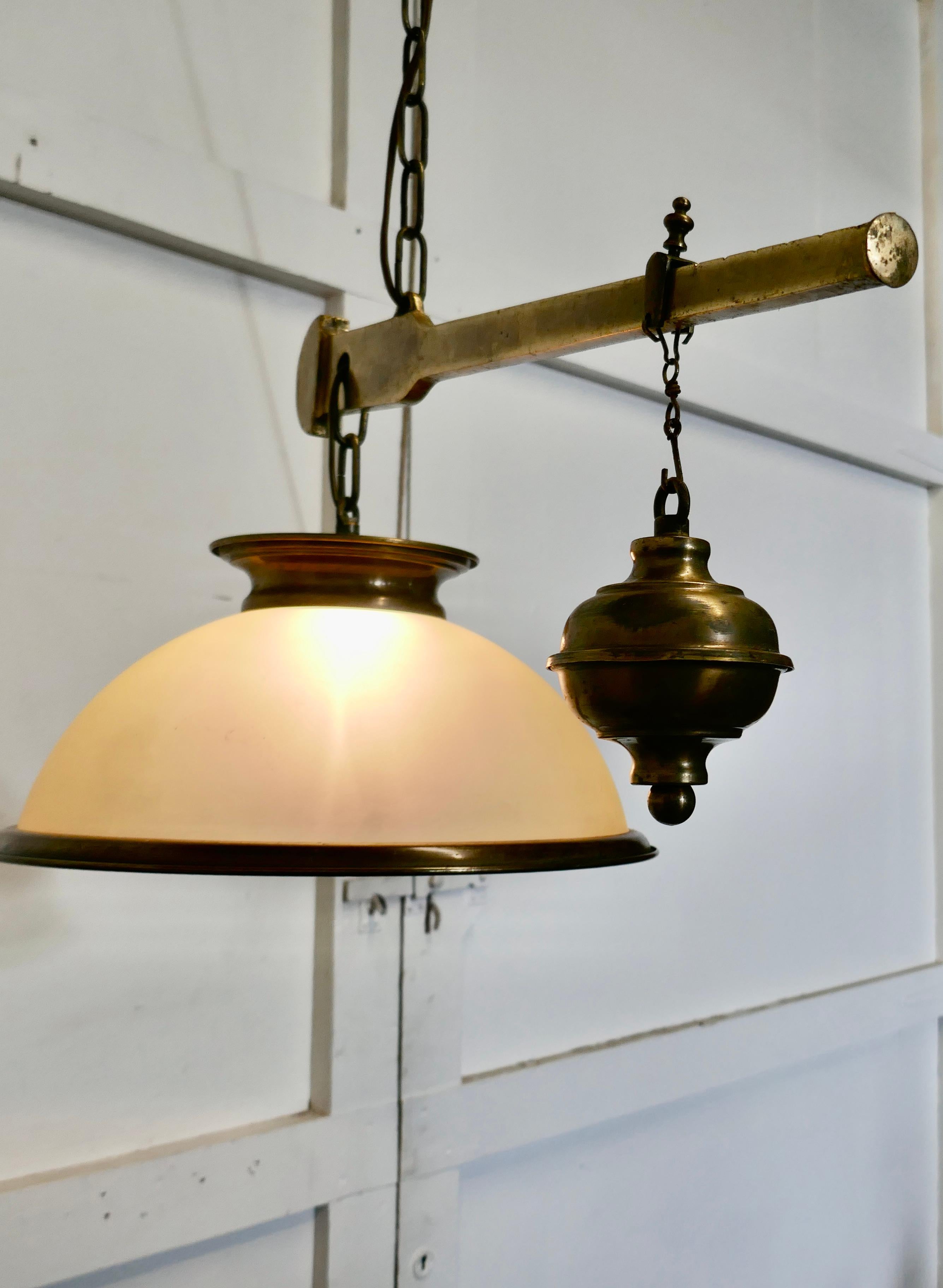 A large steelyard brass scale lamp from a Hardware Store

A very good quality lamp probably from a hardware store it has been made from a brass steelyard bar scale complete with weight and chains and a brass plaque from Louisiana, a river well